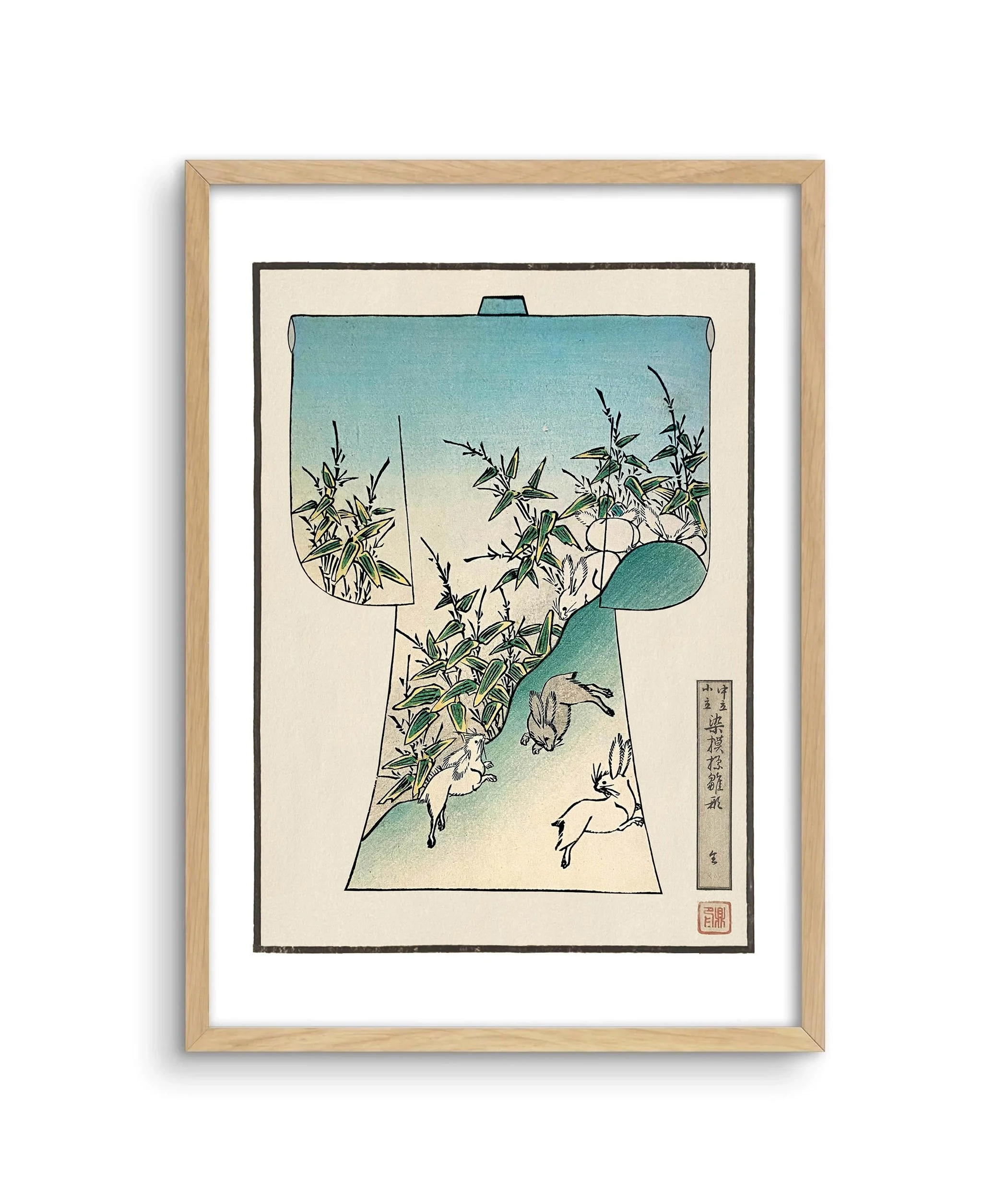 A framed image of a children's kimono design with hares playing.