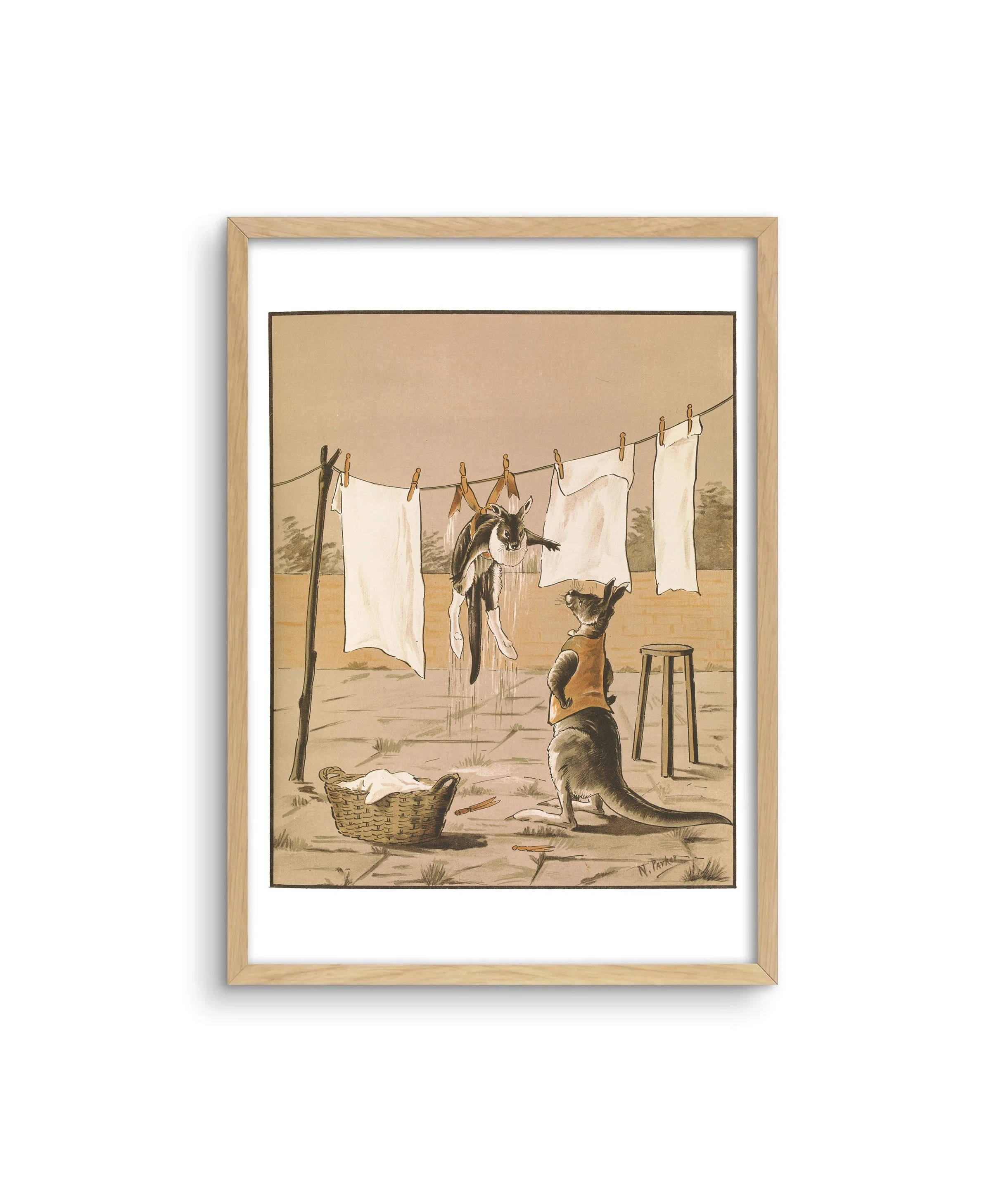 A framed Australiana print with kangaroos hanging out washing by Nancy Parker.