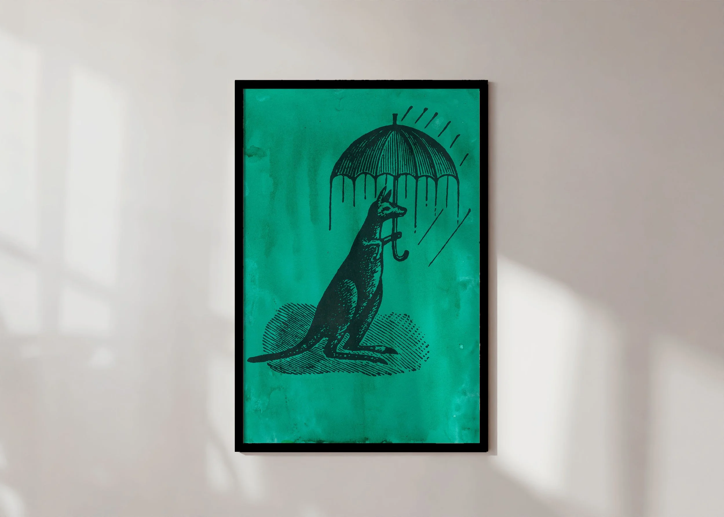 Framed print of an Australiana illustration of a kangaroo with umbrella, with a green gouache wash applied behind.