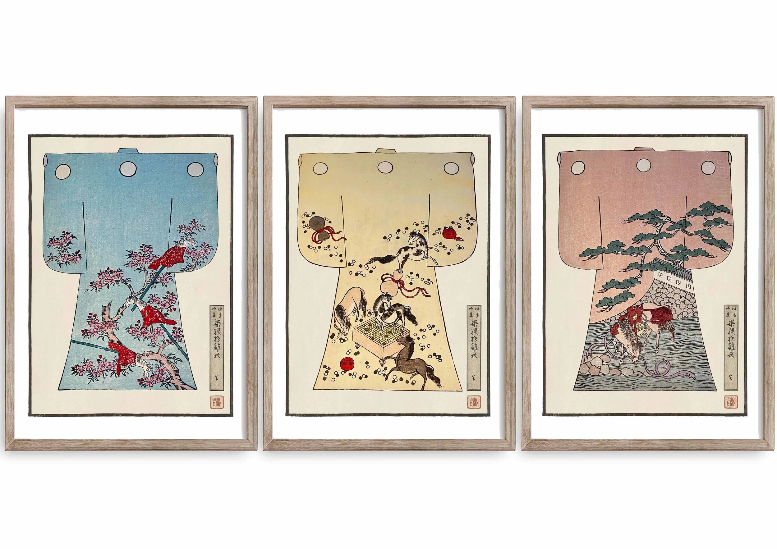 A set of three framed decorex prints of children's kimonos featuring pony designs.