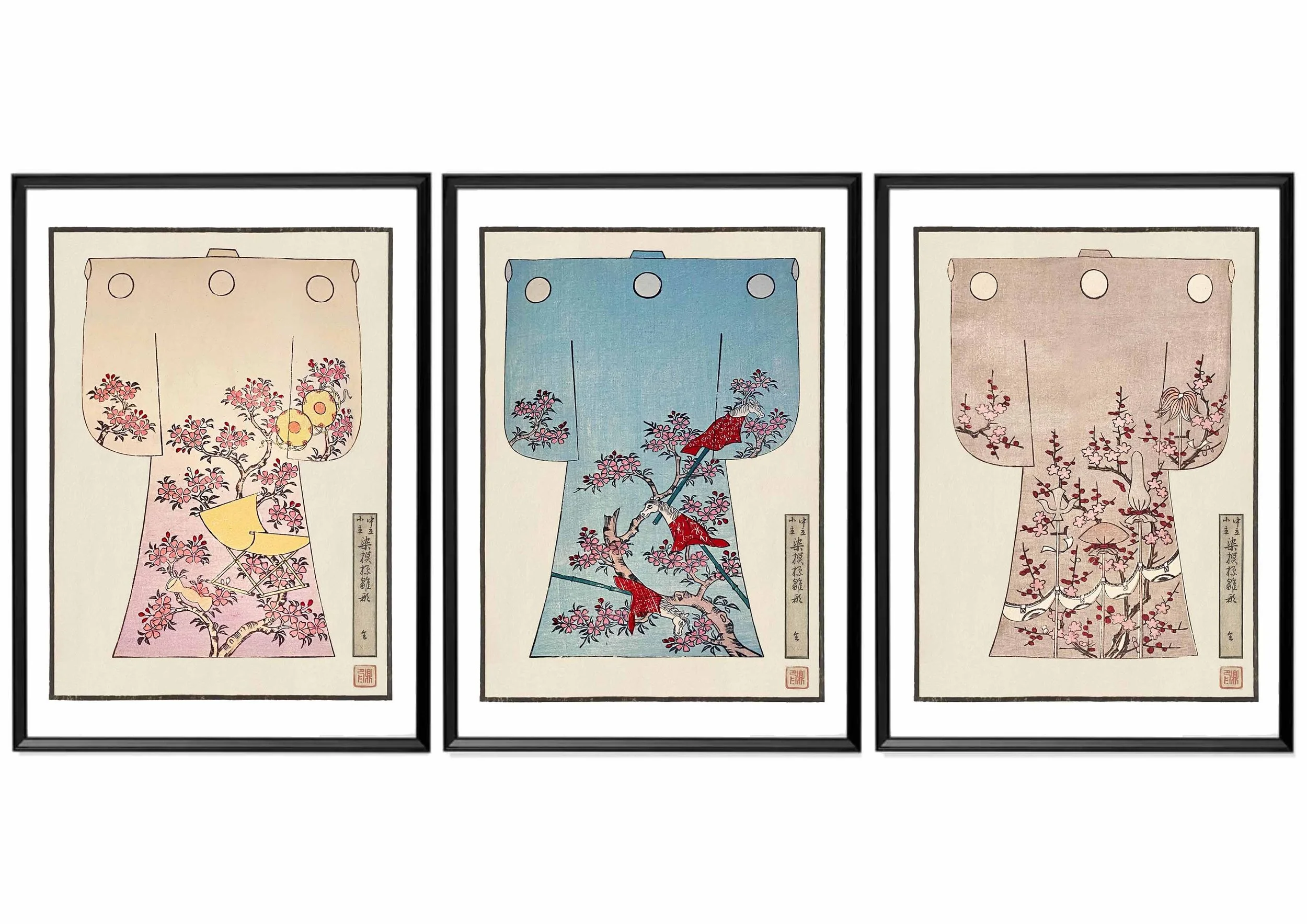 A set of three framed decorex prints of children's kimonos featuring blossom designs.