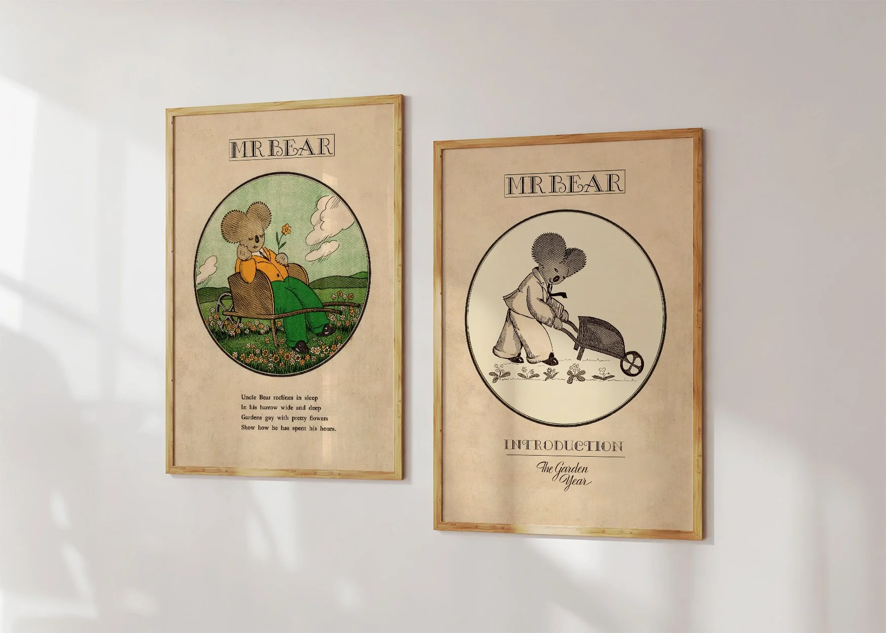 Two framed Oz prints of a koala Mr Bear, Sleepy Bear and Mr Bear pushing a wheelbarrow.