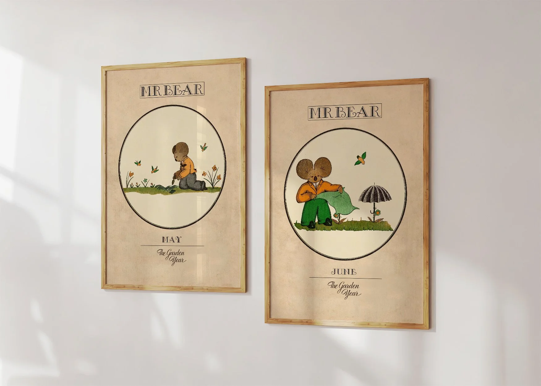 Two framed Oz prints in colour of a koala Mr Bear, planting in May and shading plants in June.