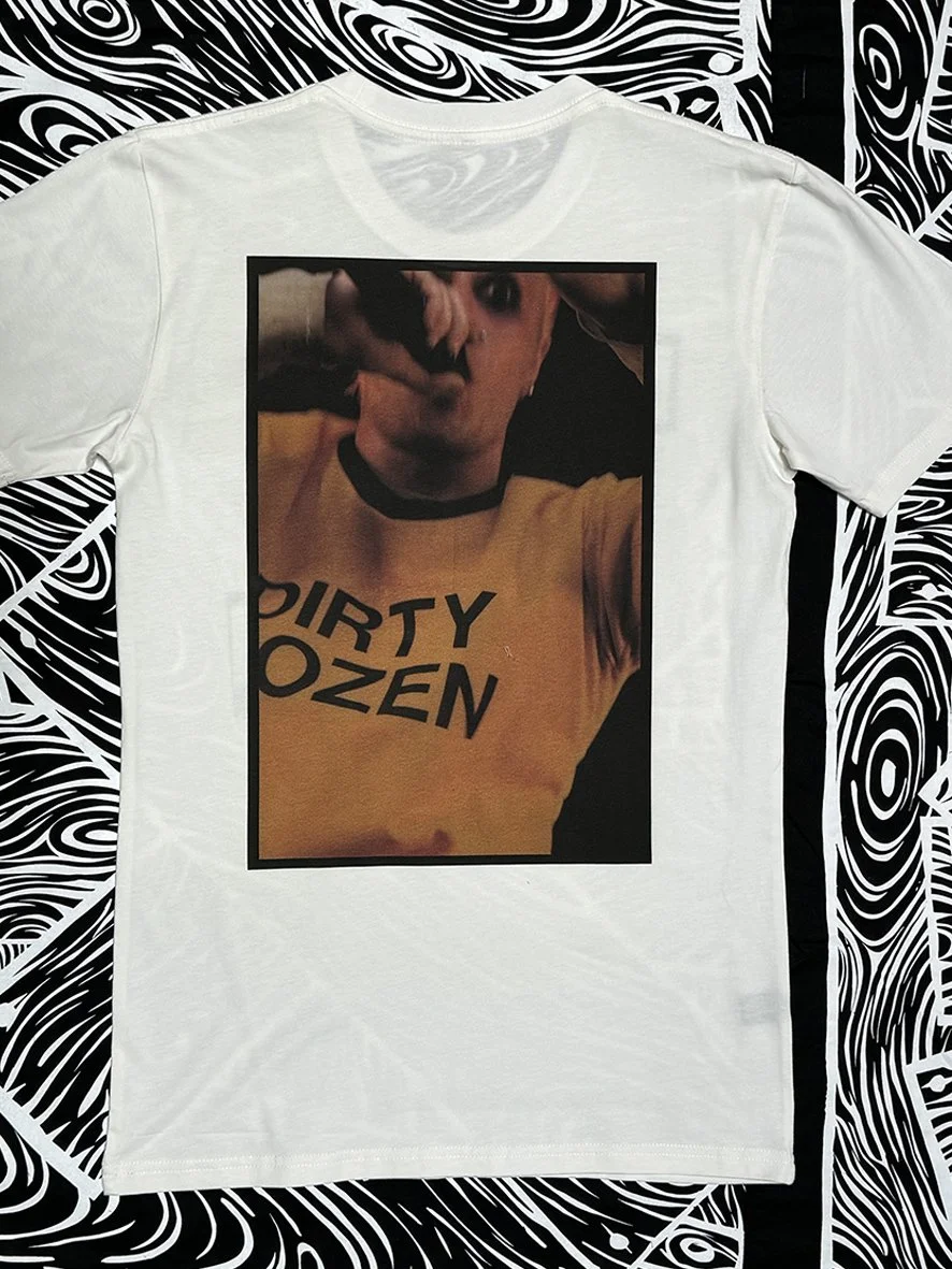 Back view of natural tee with Sophie Howarth's image of Keith from the Prodigy in a large central print.