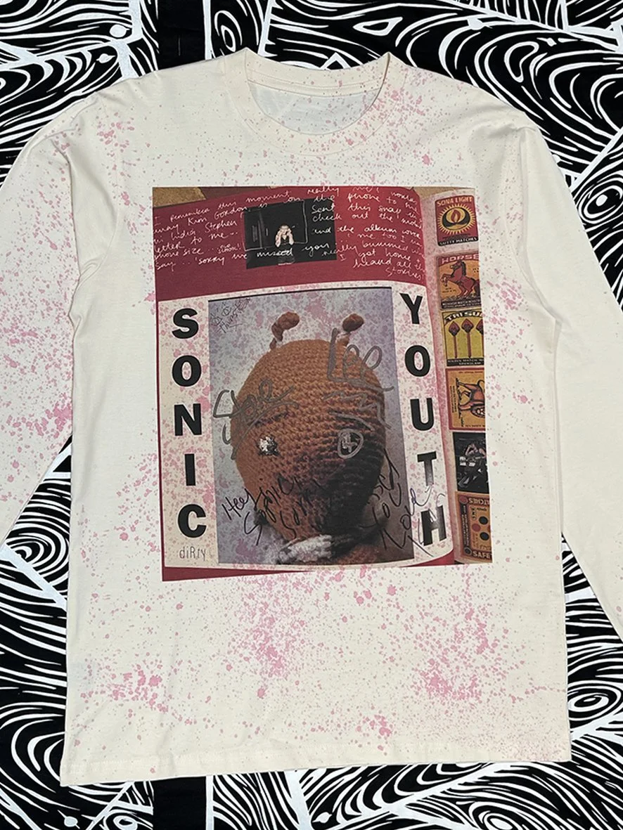 Front view of Peace Love and Brown Rice natural long sleeved tee with pink oxidised treatment with a large Sophie Howarth Sonic Youth print.