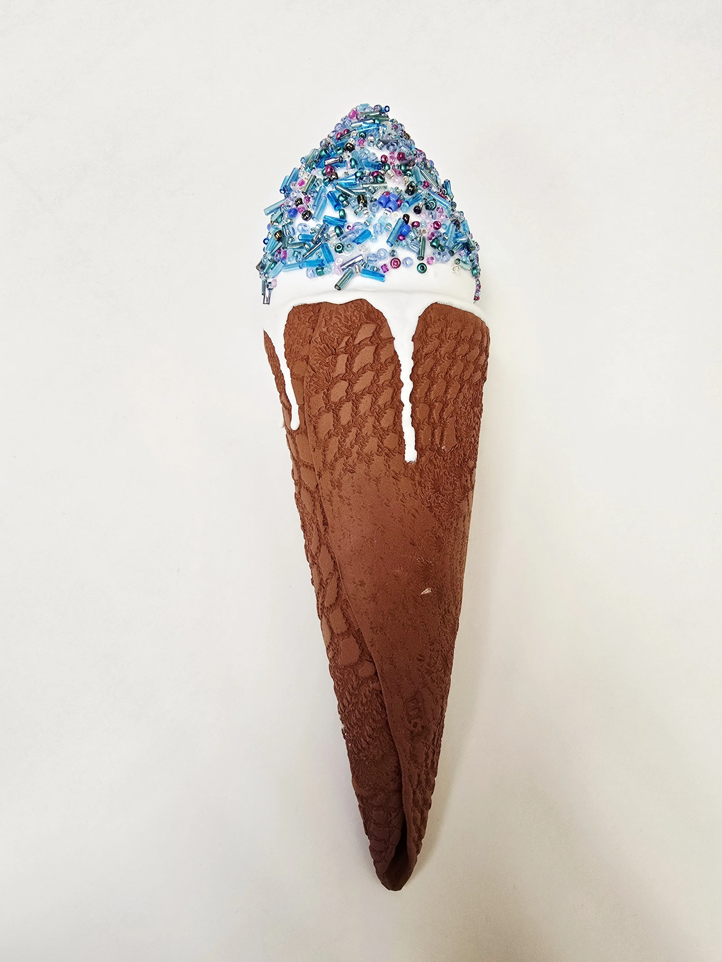  101. Tatyanna Meharry 
  Sparkle-cream! #4  
 (2026)
 Ceramic, glass
 260 x 70 x 70
 $250