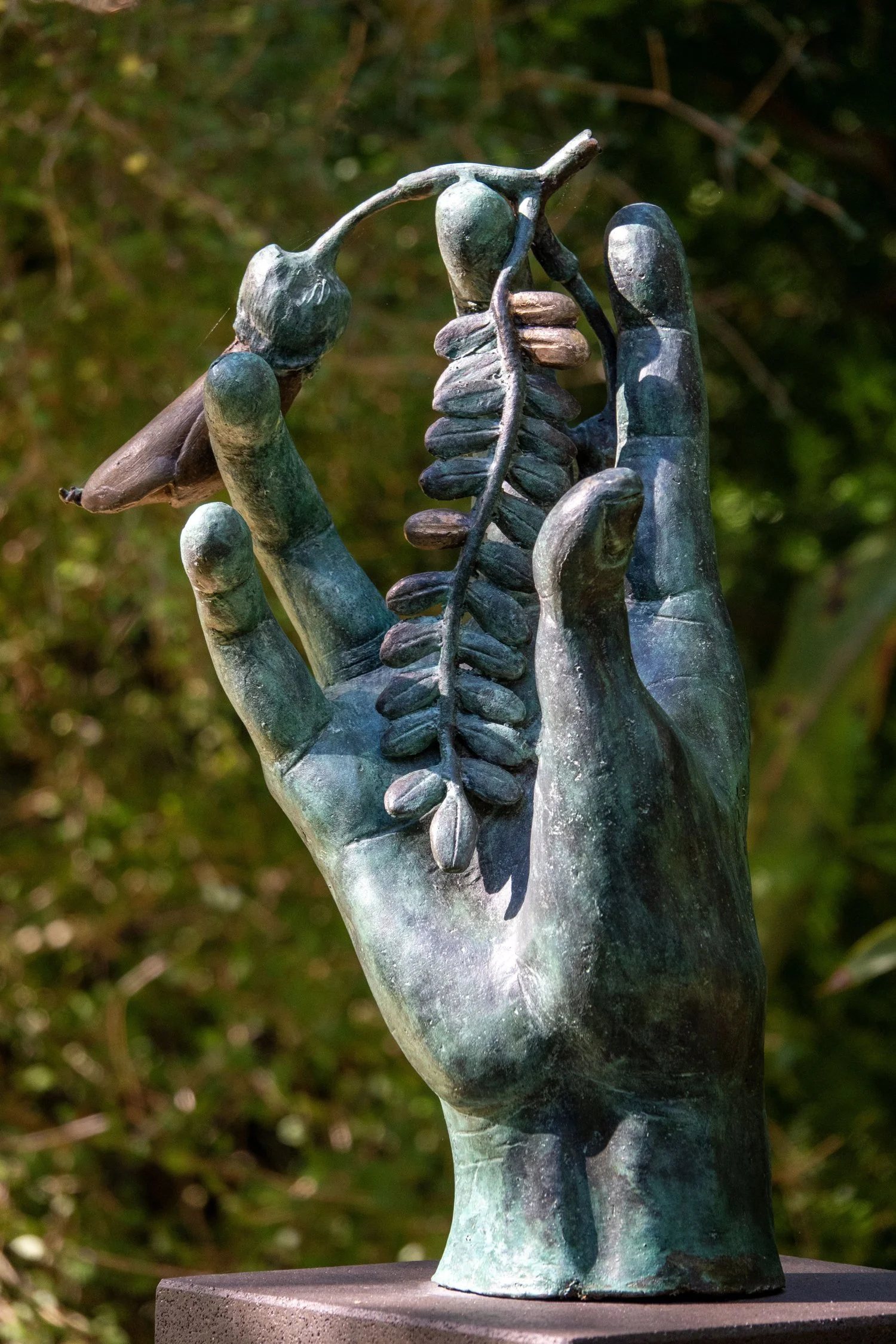  39. Samantha Lissette 
  Held in Bud  
 (2025)
 Bronze on Timaru bluestone plinth
 1500x350x350mm
 Ed. 1 of 3
 $14,900