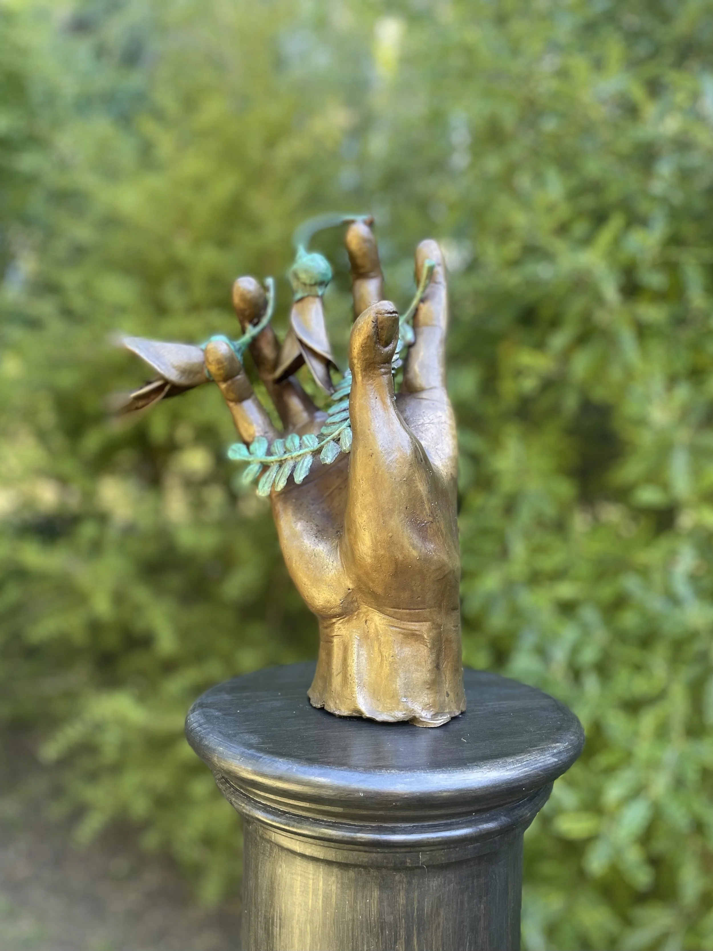 Map_40_Samantha-Lisette-Held-in-Blossom-2025-bronze-at-TSG.jpg
