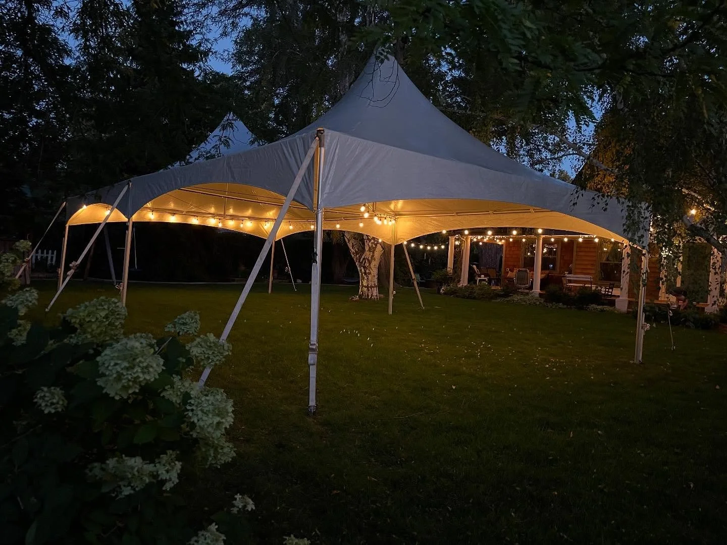 Keep the celebration going after sunset with our 20x40 high peak tent - complete with lights!