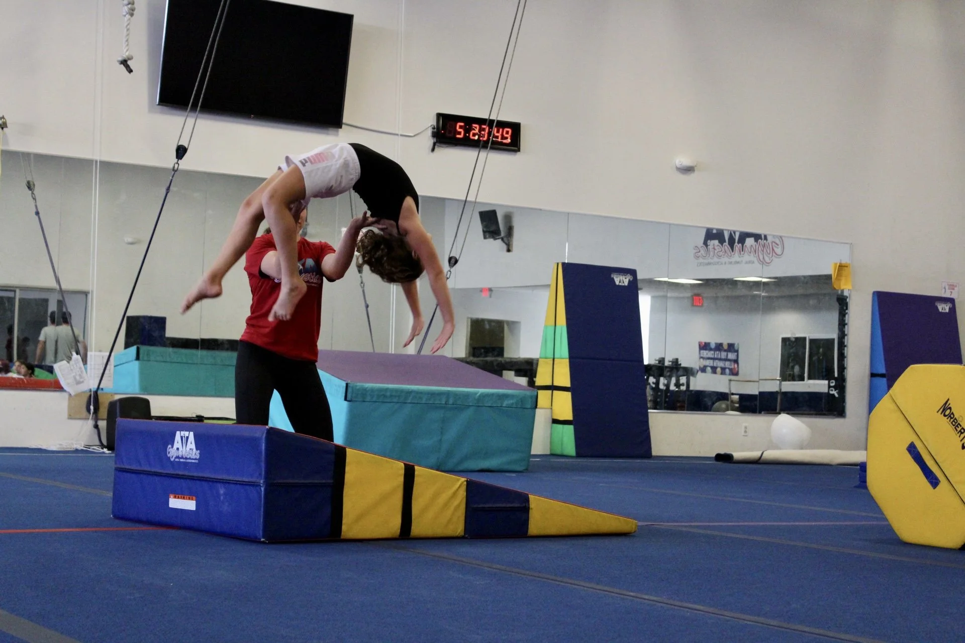 Tumbling Progressions: From Backward Roll to Back Tuck
