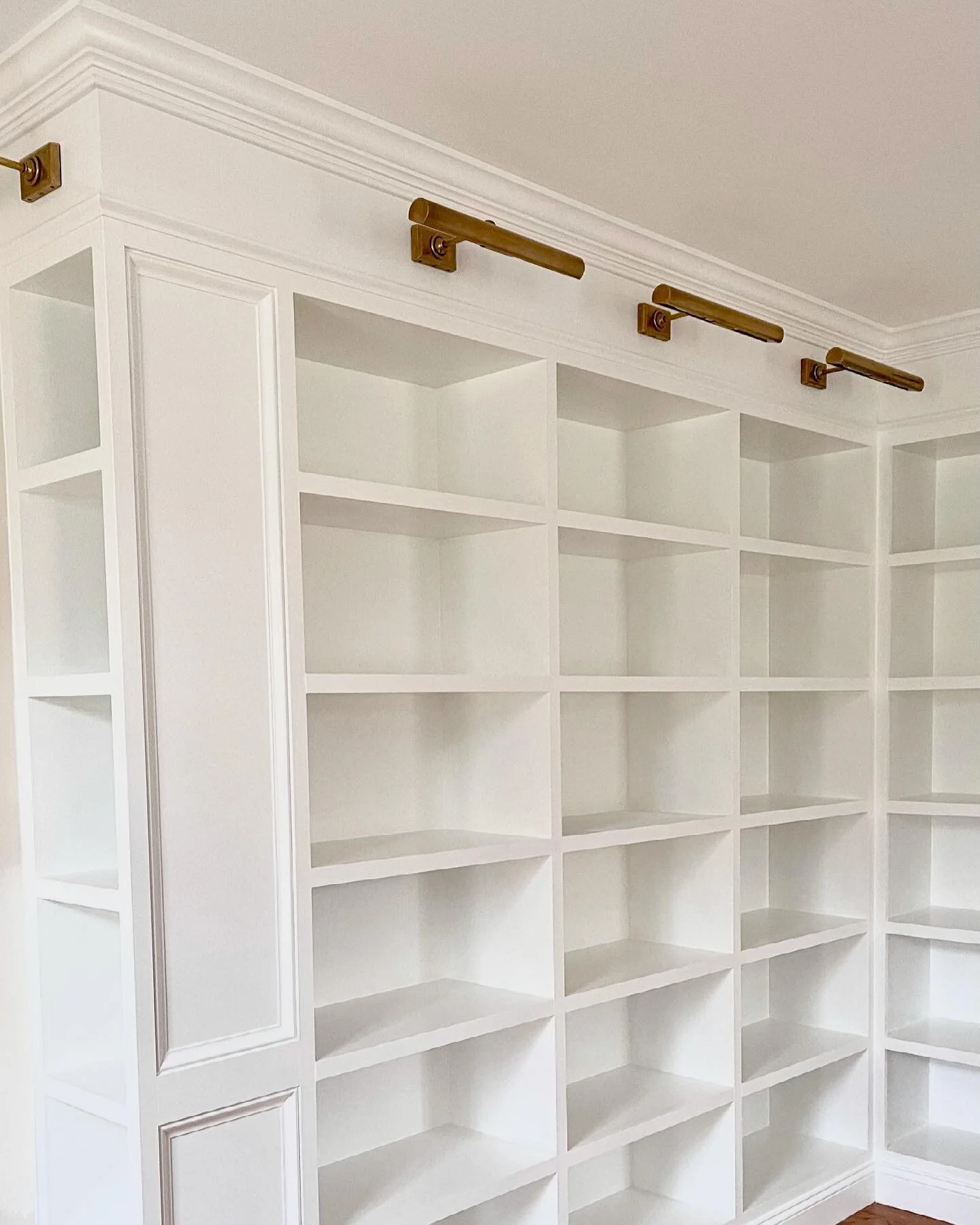 Custom built ins are always a good idea. 

design: @ashleymshaver of @grasonshaver 
sconces: @circalighting
paint: Simply White by @benjaminmoore 

#baltimoreinteriordesigners #custombuiltins #simplywhitebenjaminmoore #librarysconces #customcarpentry