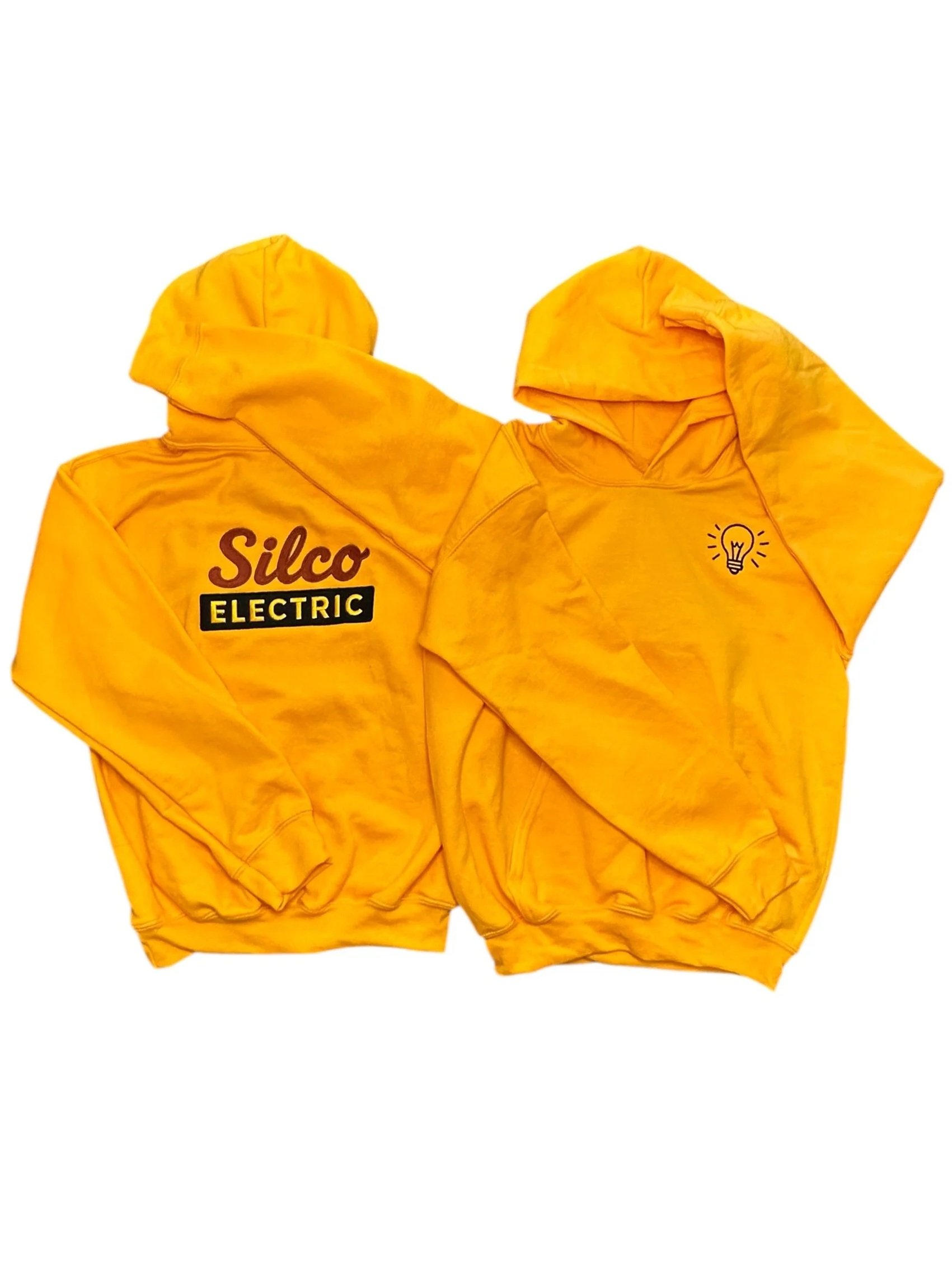 Two yellow hoodies, one with 'Silco Electric' logo and the other with a light bulb icon.