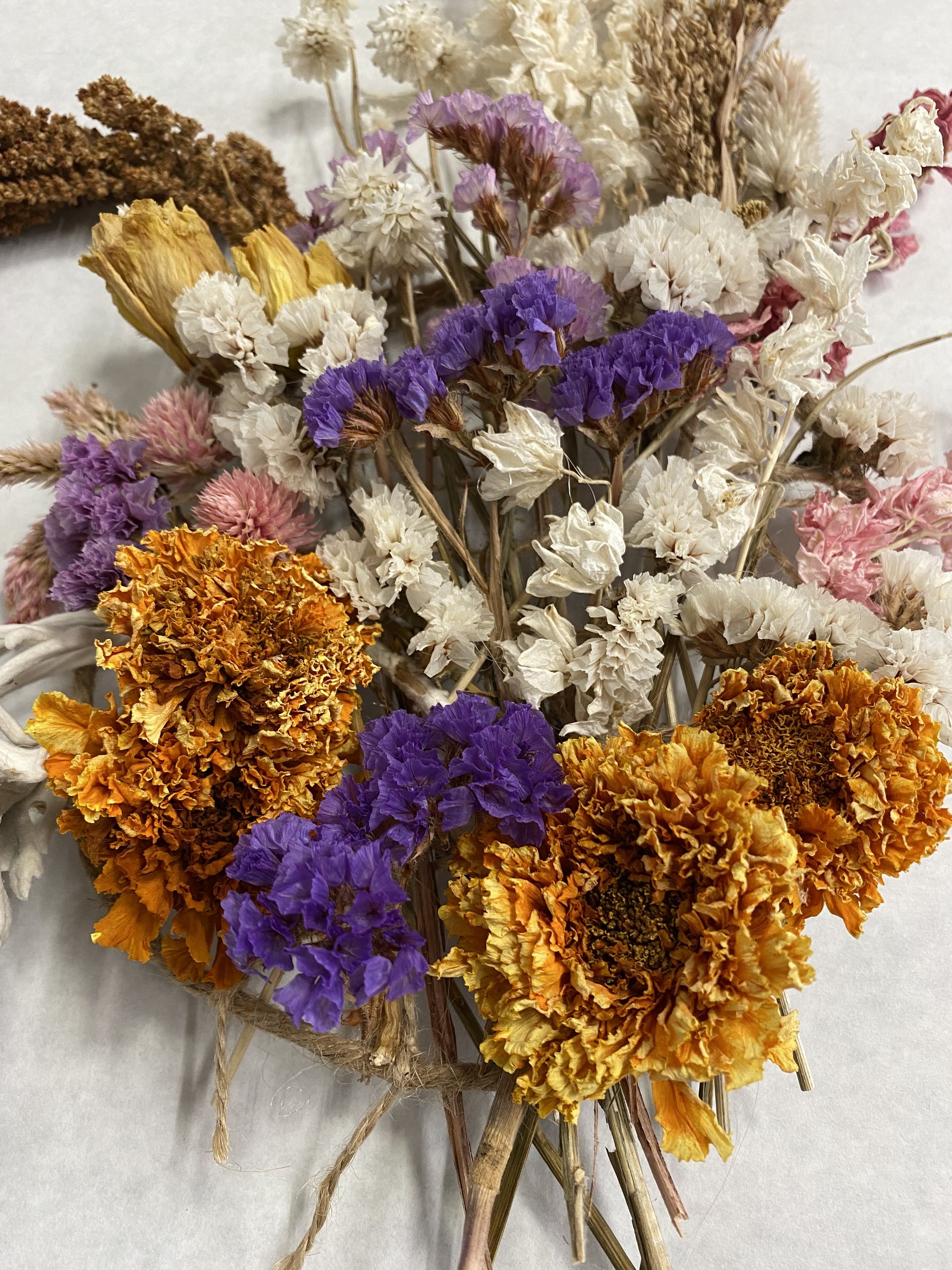 Dried Flower Wall Hanging: A great way to use flowers from a special event into something you'll want on your wall forever.