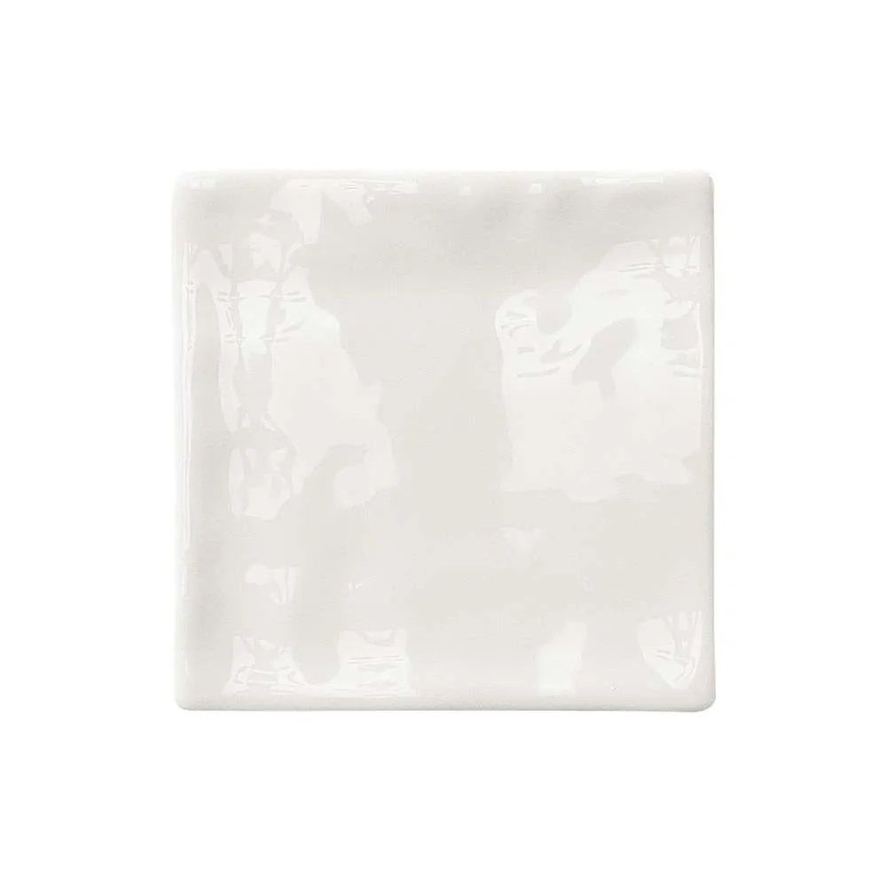 Light gray subway tile from the Venice collection, adding a modern and clean look to interiors.