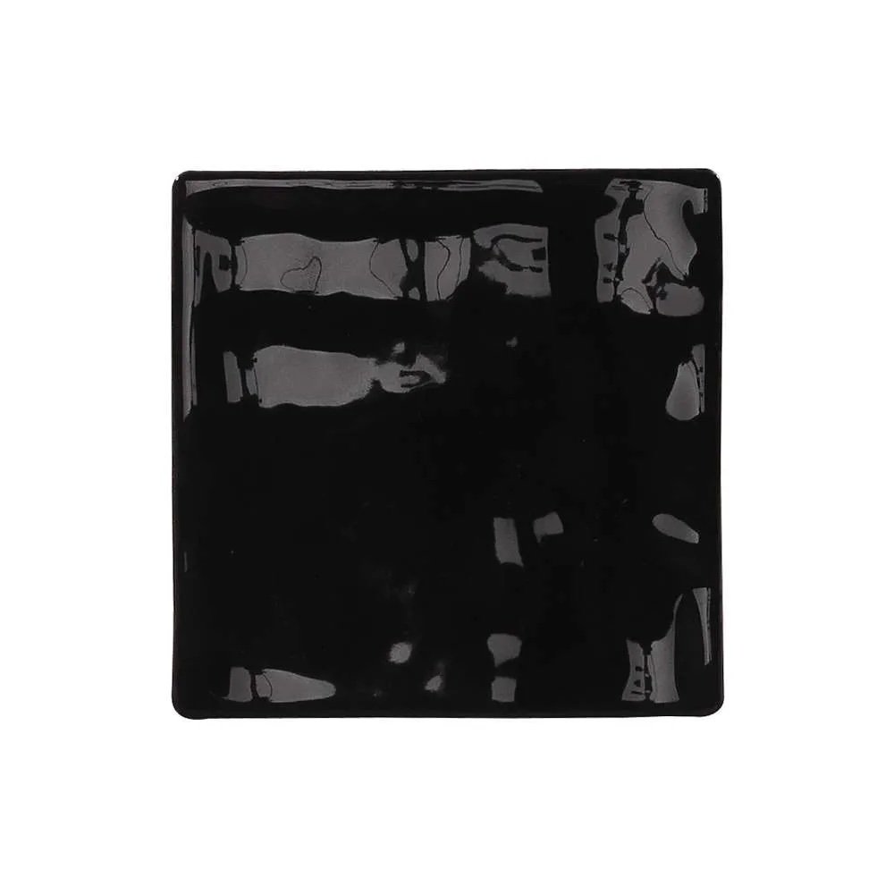 Glossy black subway tile from the Venice collection, ideal for bathroom walls that demand elegance.