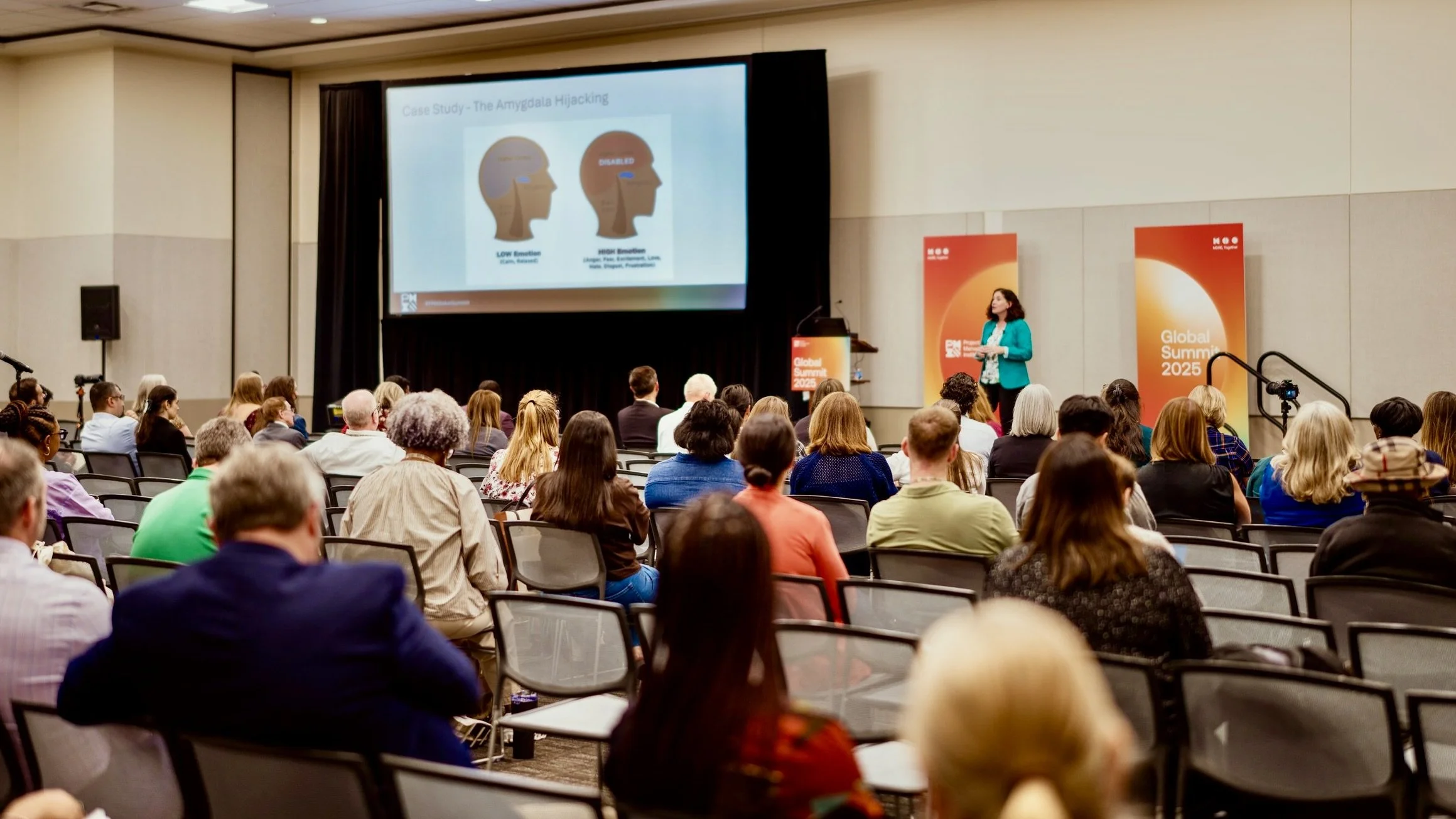 Annmarie Curley presenting to a full room at the PMI Global Summit 2025.