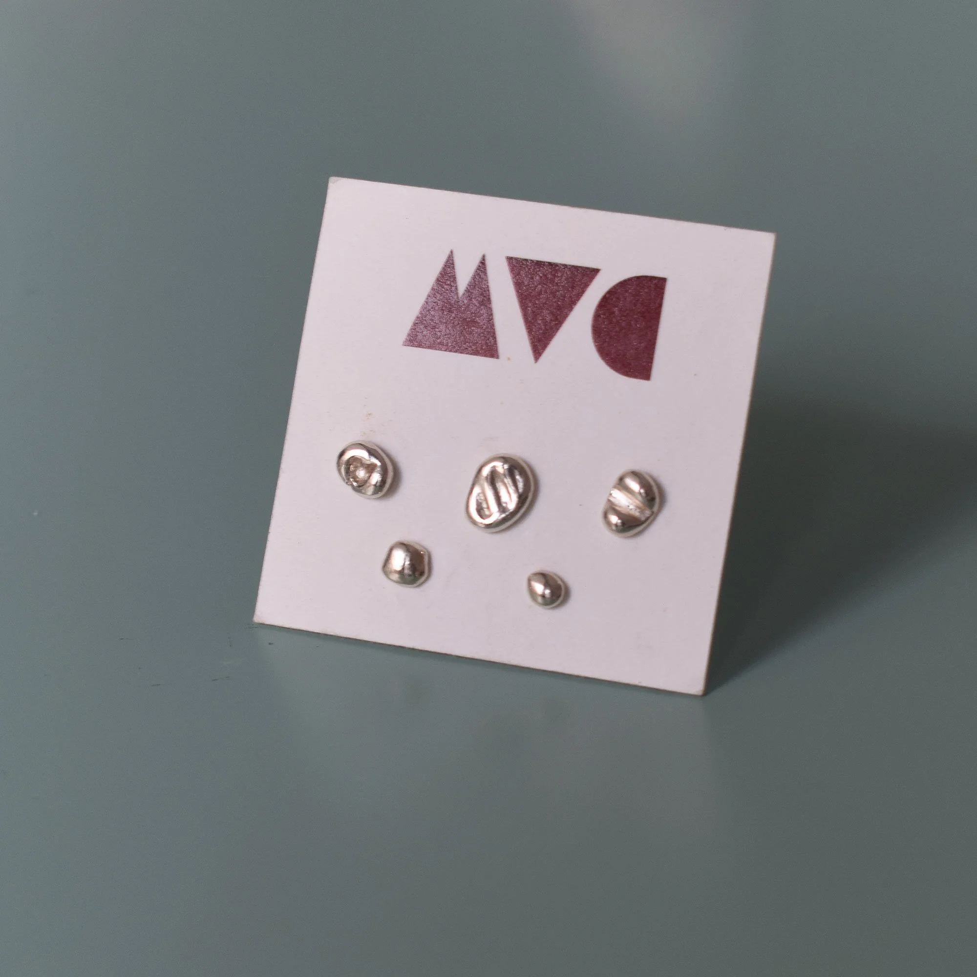 Minimalist asymmetrical sterling silver 925 stud earrings combo, a set of 5,  with an abstract organic aesthetic. Sustainably handmade using the silver granulation technique in our jewelry workshop