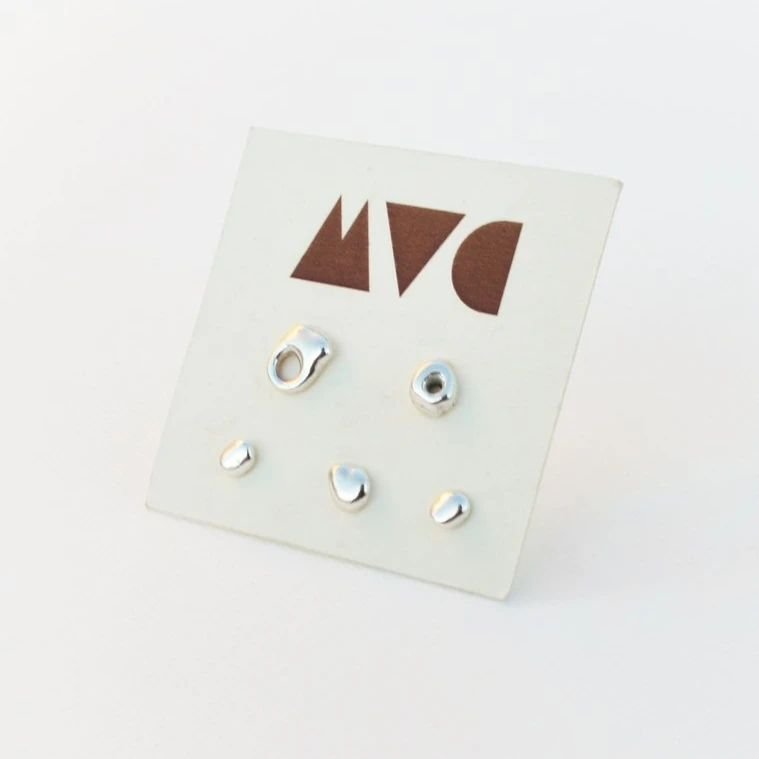 Asymmetry has the advantage that its complete appearance is far more optically effective than symmetry.
If this resonates with you then this is the perfect studs combo to have!

&bull;Mixed Shapes Studs Combo in Silver - Zero Waste collection (link i