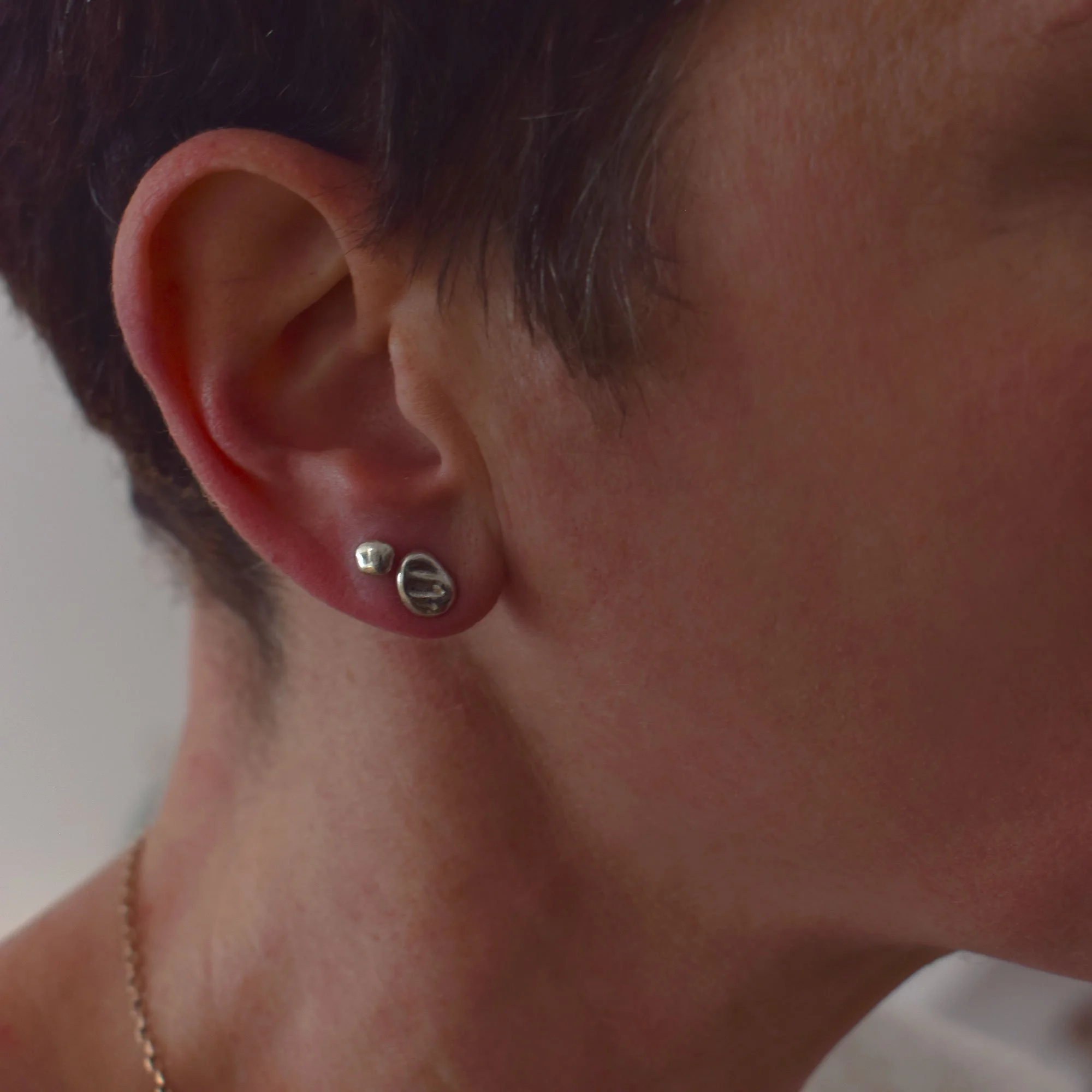 Minimalist, dainty studs set of 5, with imprint textures, sustainable handmade by melting our silver scraps from other designs, creating free form organic shapes so each stud is unique.