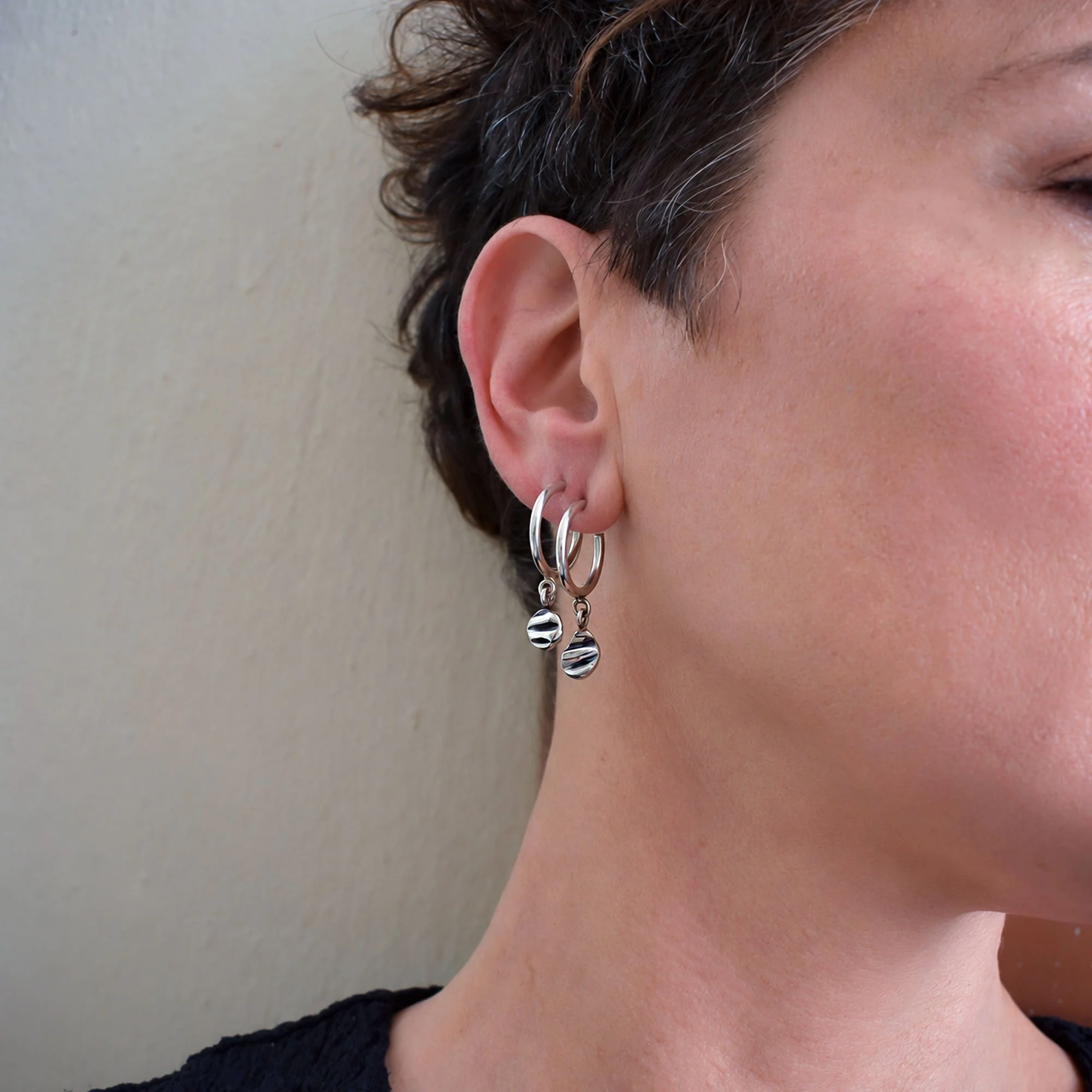 Recycled sterling silver 925 hoop earrings with tactile sea shell impressions, hand-fabricated earrings with a boho aesthetic perfect for stacking.