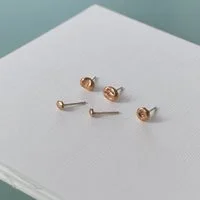 Freeform molten bronze stud earrings combo with mismatched irregular shapes and textures that are perfect to mix and match. Ethically handmade in a small jewelry studio in Greece.