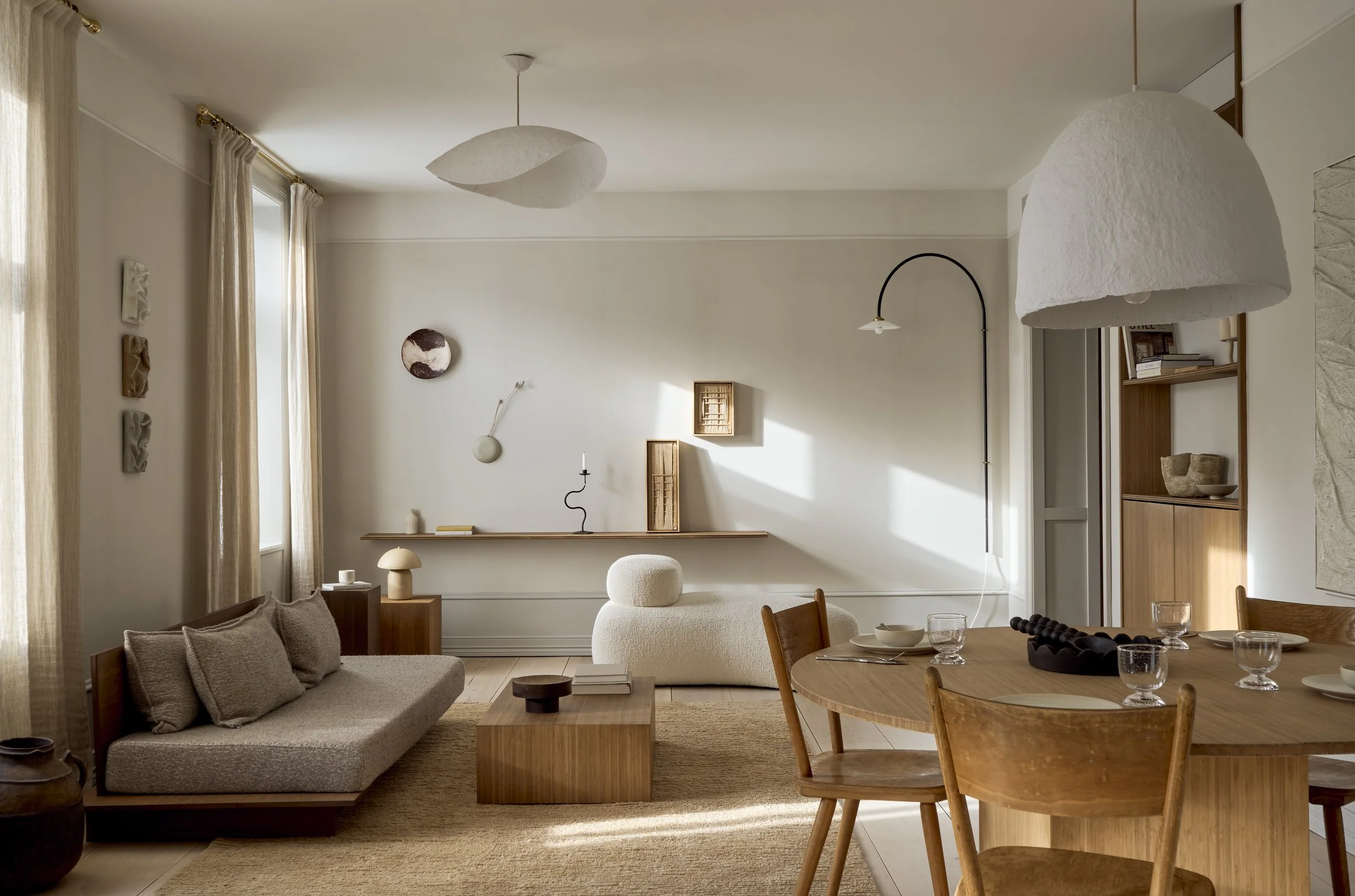 The Ask og Eng House living room in Drammen featuring custom bamboo furniture and minimalist neutral decor. 