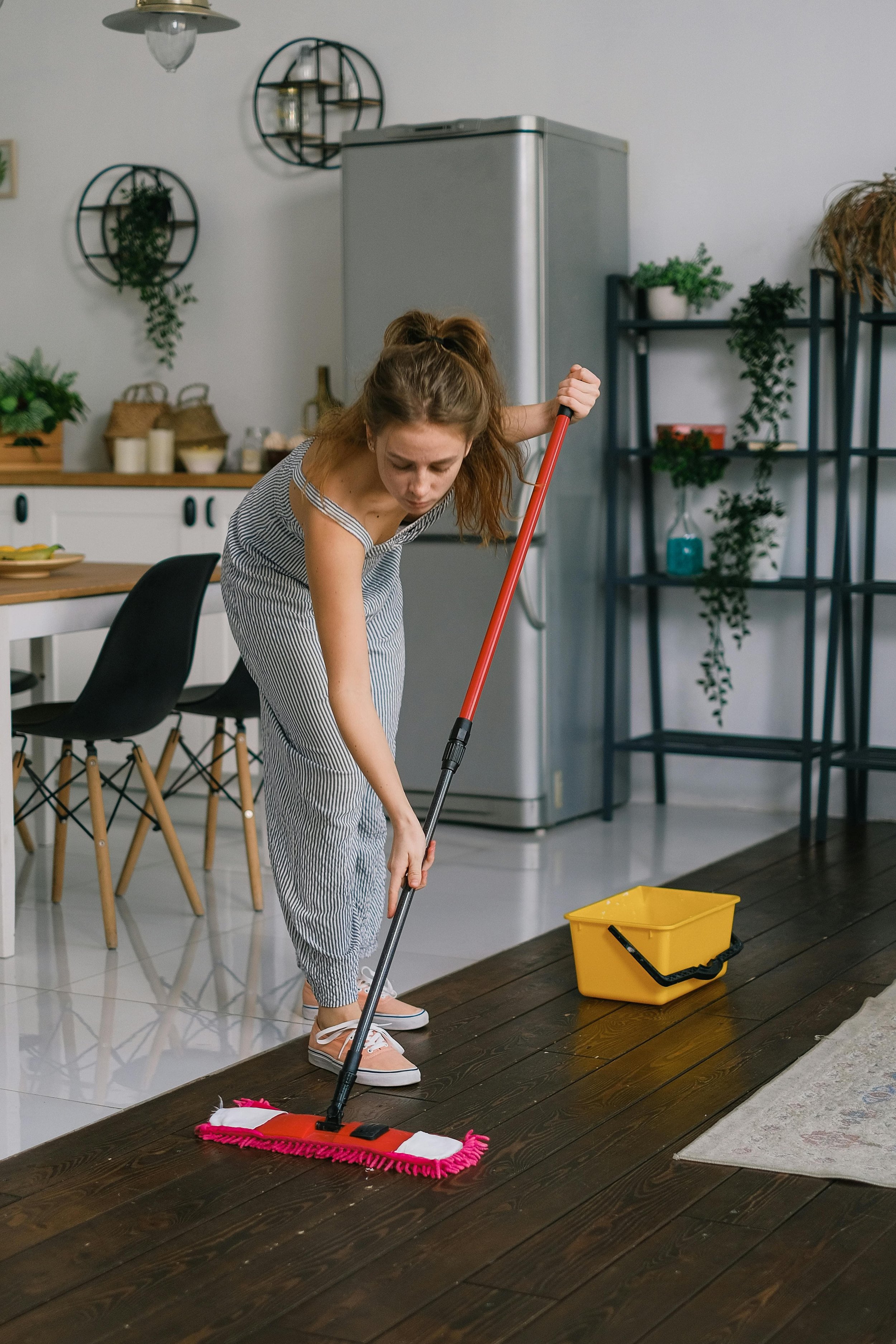A woman cleaning her floors