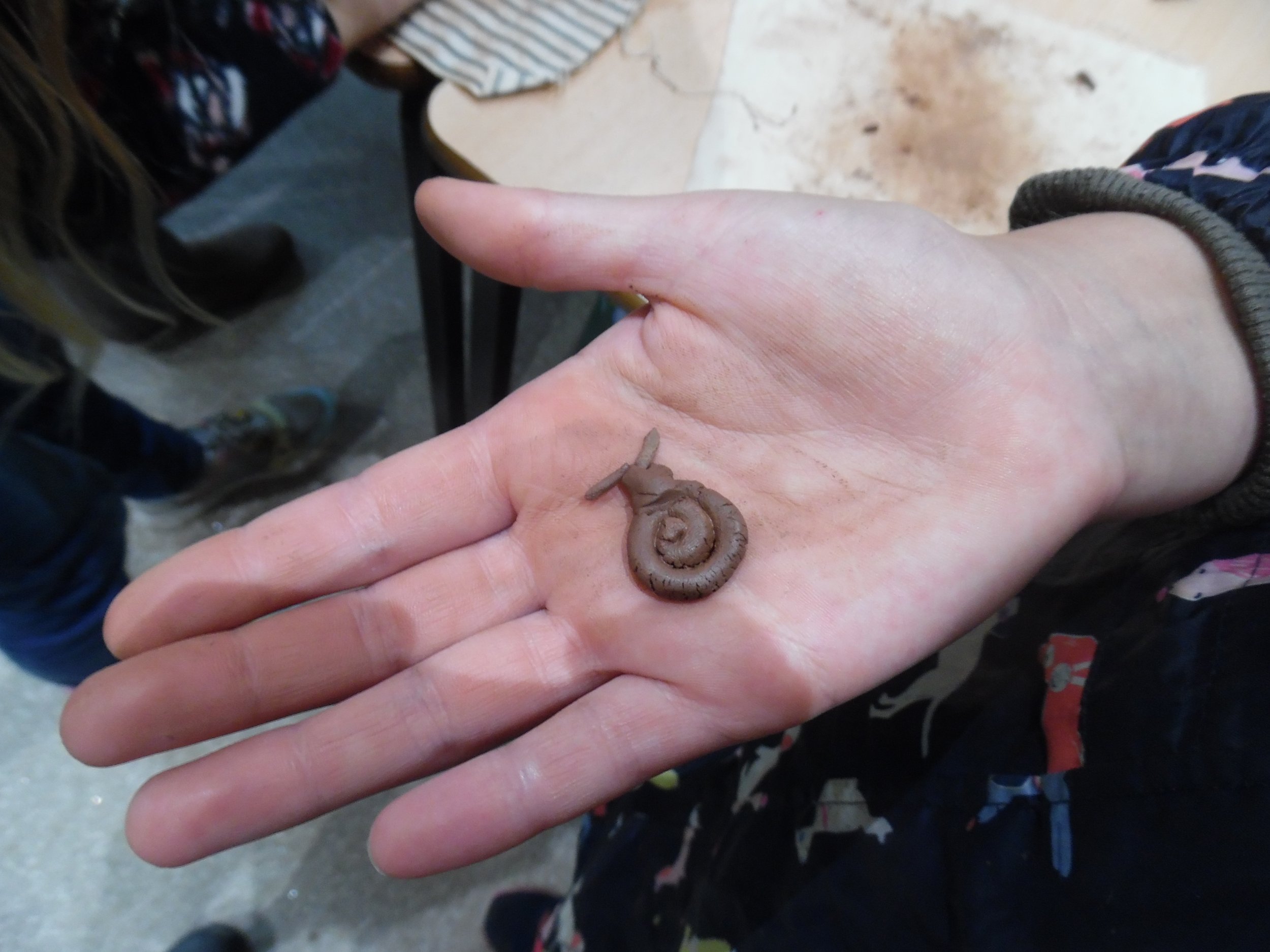 Young maker's clay model of tiny endangered Little Whirlpool Ramshorn Snail from the Outdoor Studios, Back from the Brink project
 I coordinated & co-led

