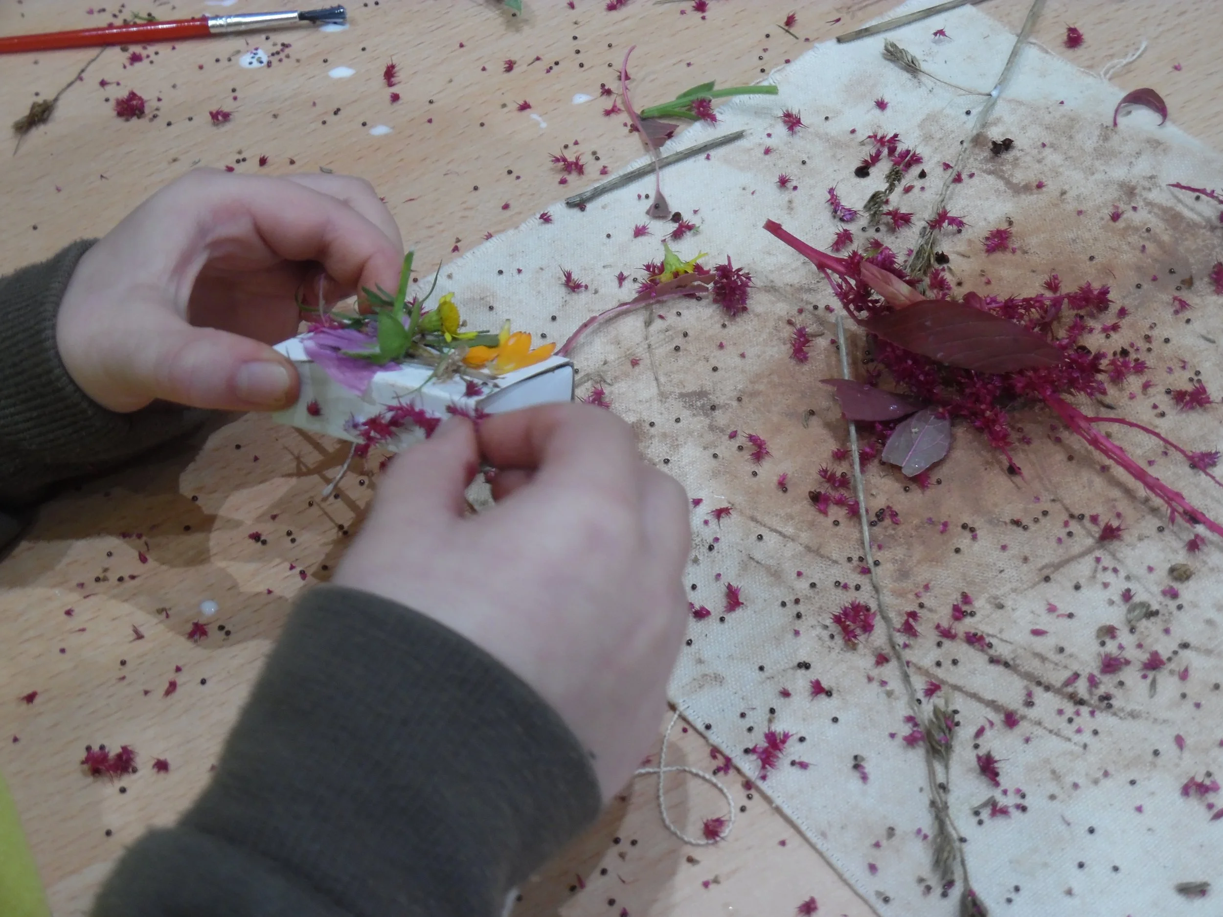 Young maker using natural materials we foraged from the beautiful site
