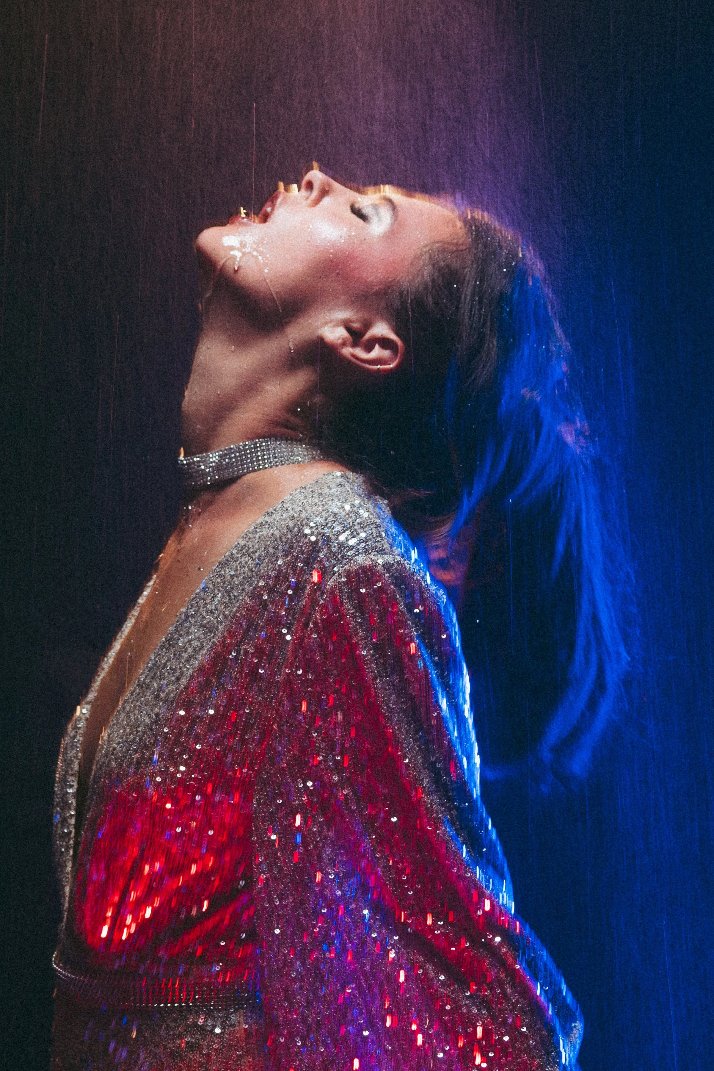 Editorial musician portrait photo artist session photo shoot rain colored light studio blurry