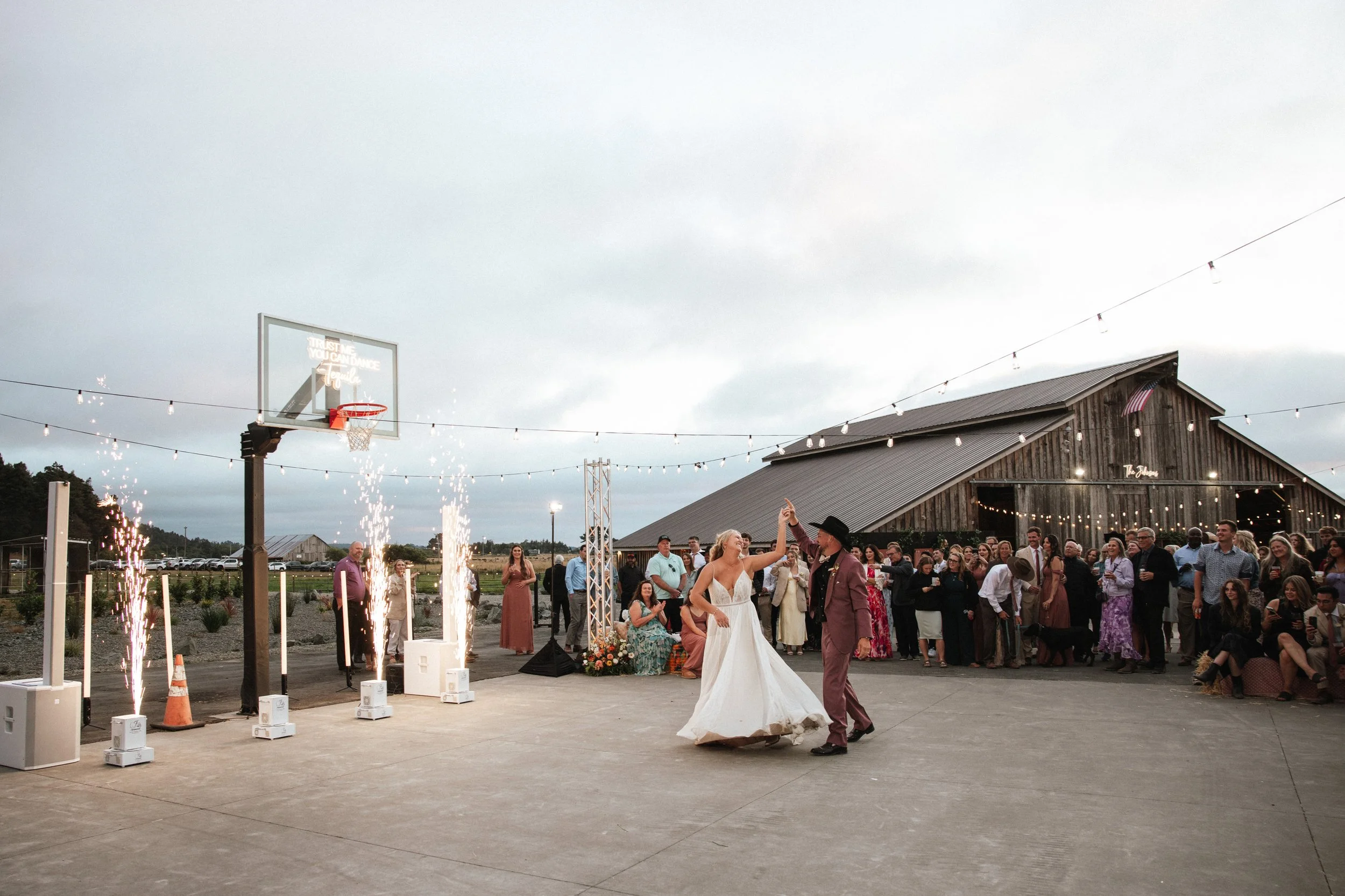 First dance private estate cold sparklers sparks barn western summer wedding reception