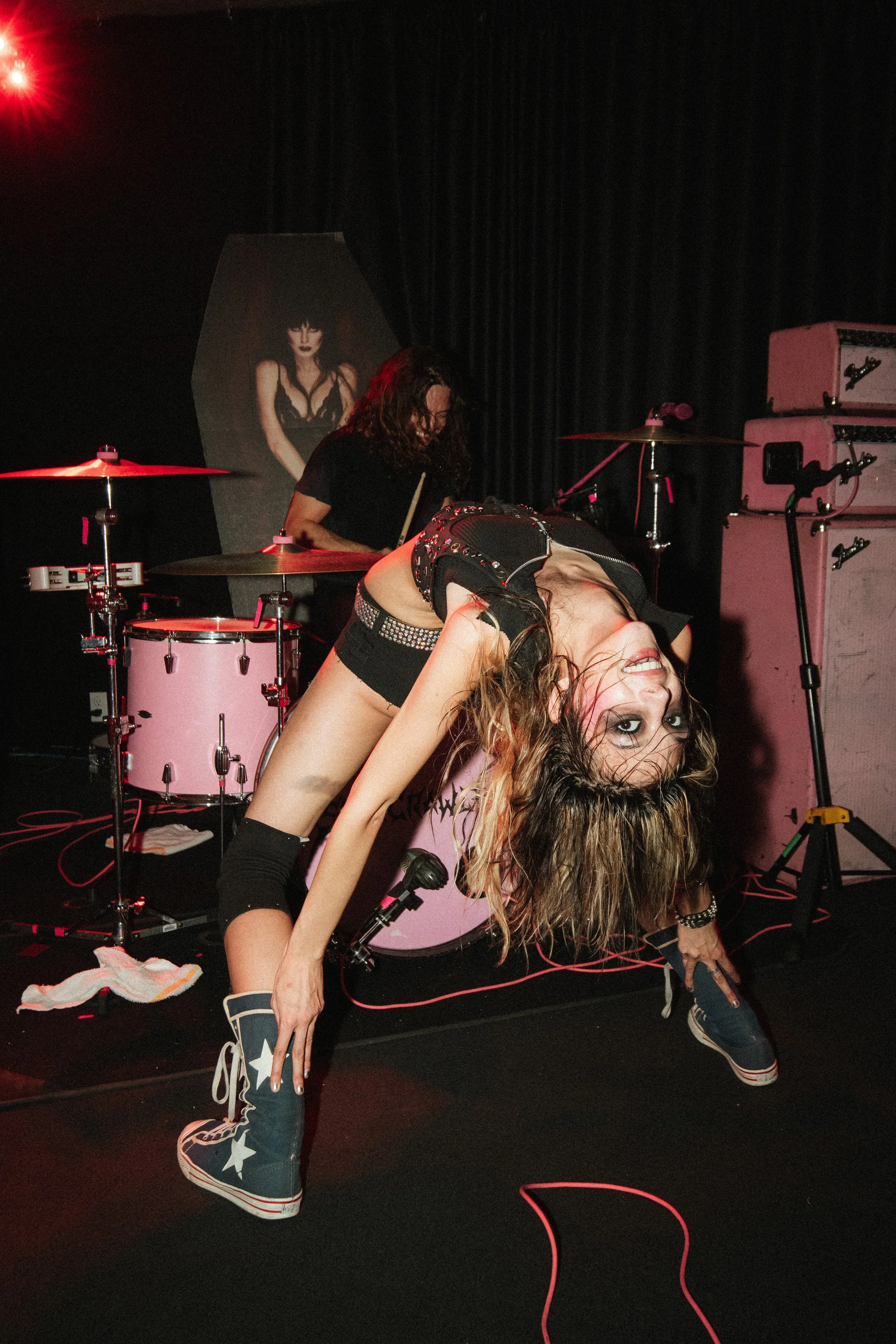 Flash photo of Arrow DeWilde, lead singer of Starcrawler, at Harlow's Starlite Room in Sacramento CA 10/27/2026— by local Concert Photographer Nicole Sepulveda