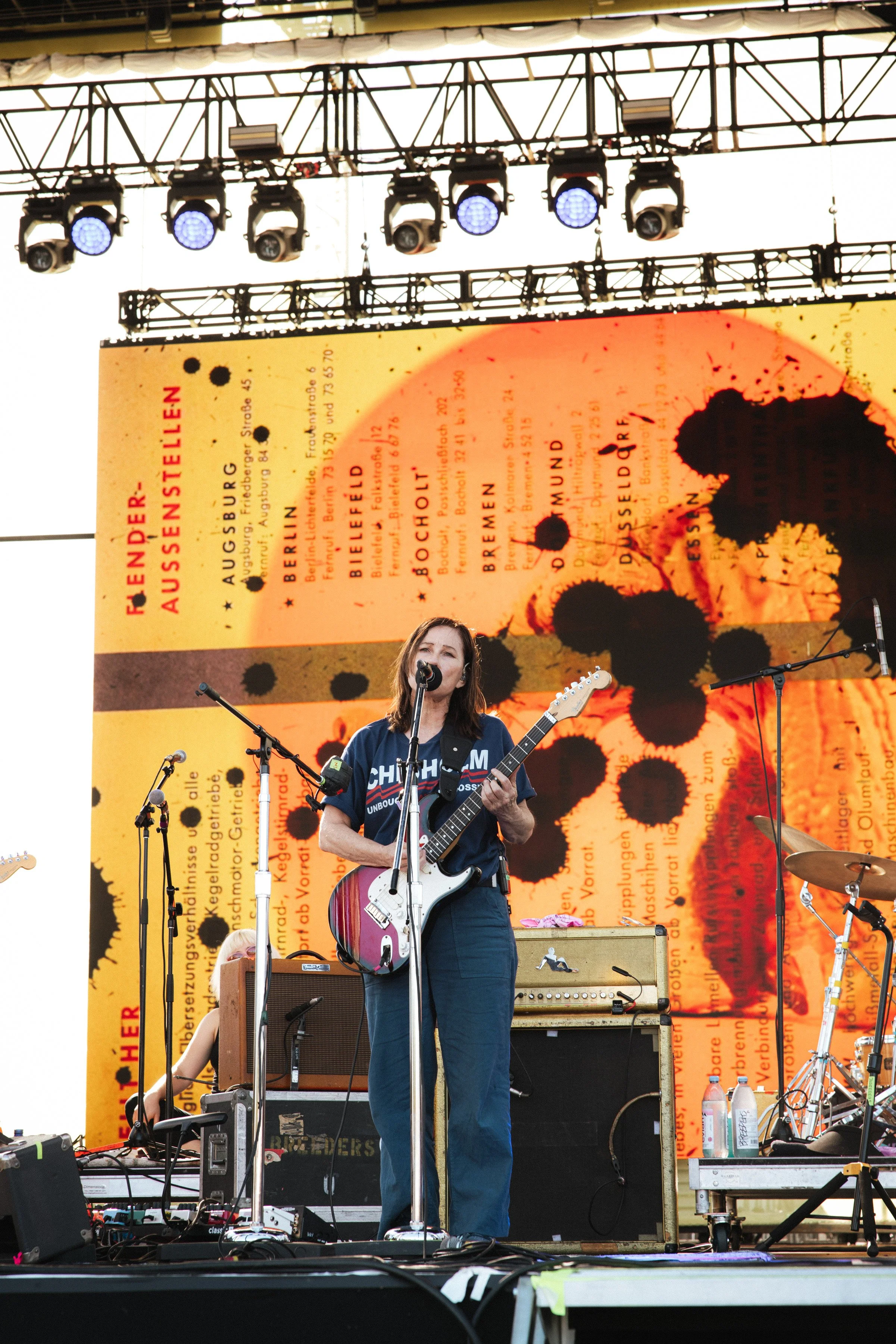 Kim Deal of the Breeders performing at Daisy Chain Fields Festival on the Marigold Stage by music photographer Nicole Sepulveda