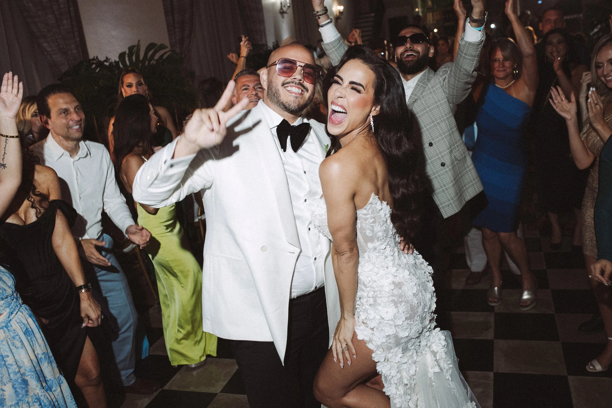candid reception dancing bright flash film editorial dance floor san juan puerto rico wedding luxury event