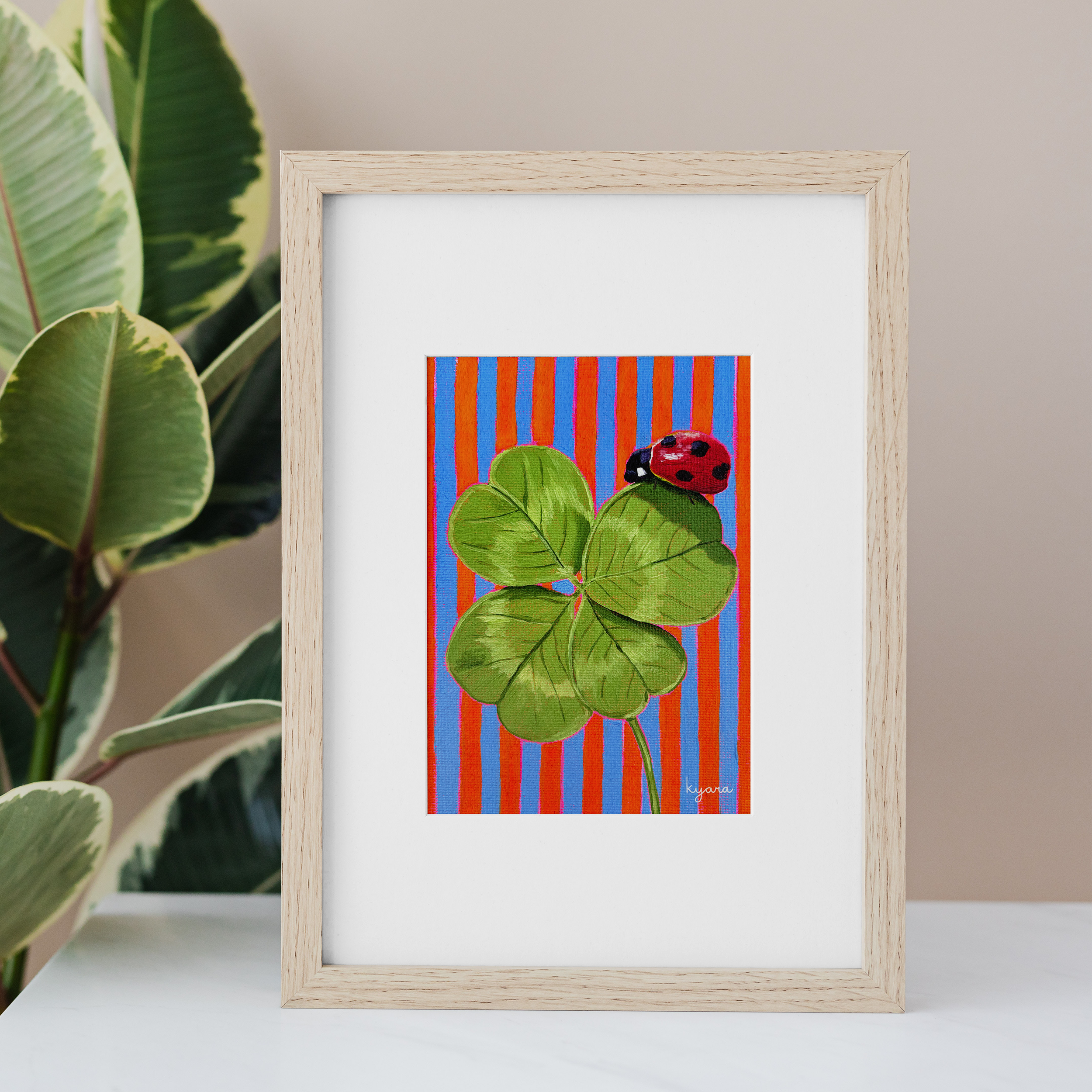 ladybug clover print mockup frame.png