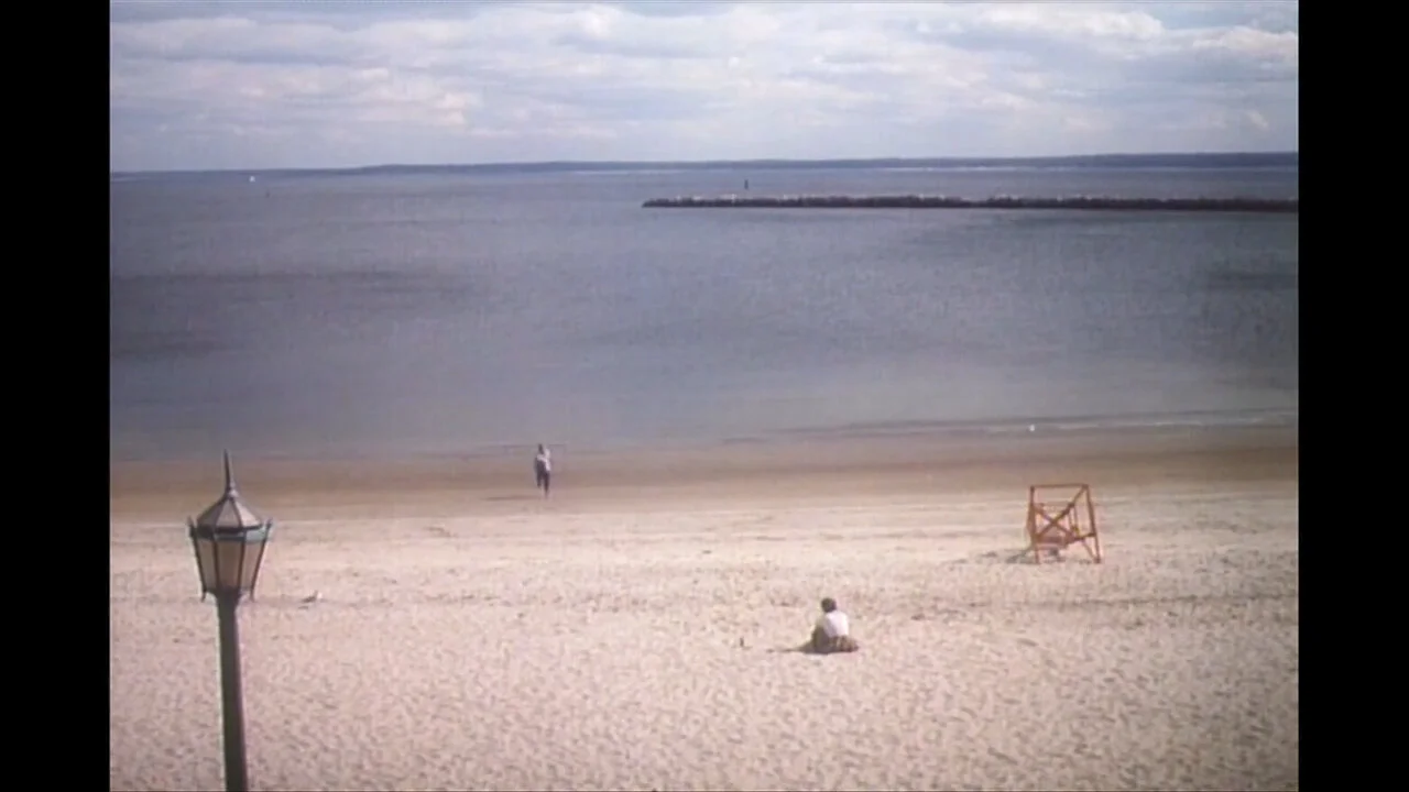 WWA Aleksa running into ocean.jpg