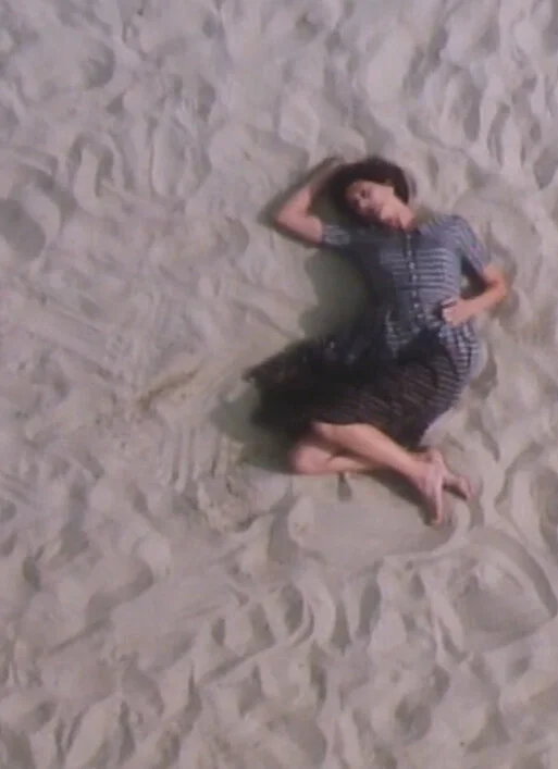 WWA Claire lying in sand cropped portrait.jpg