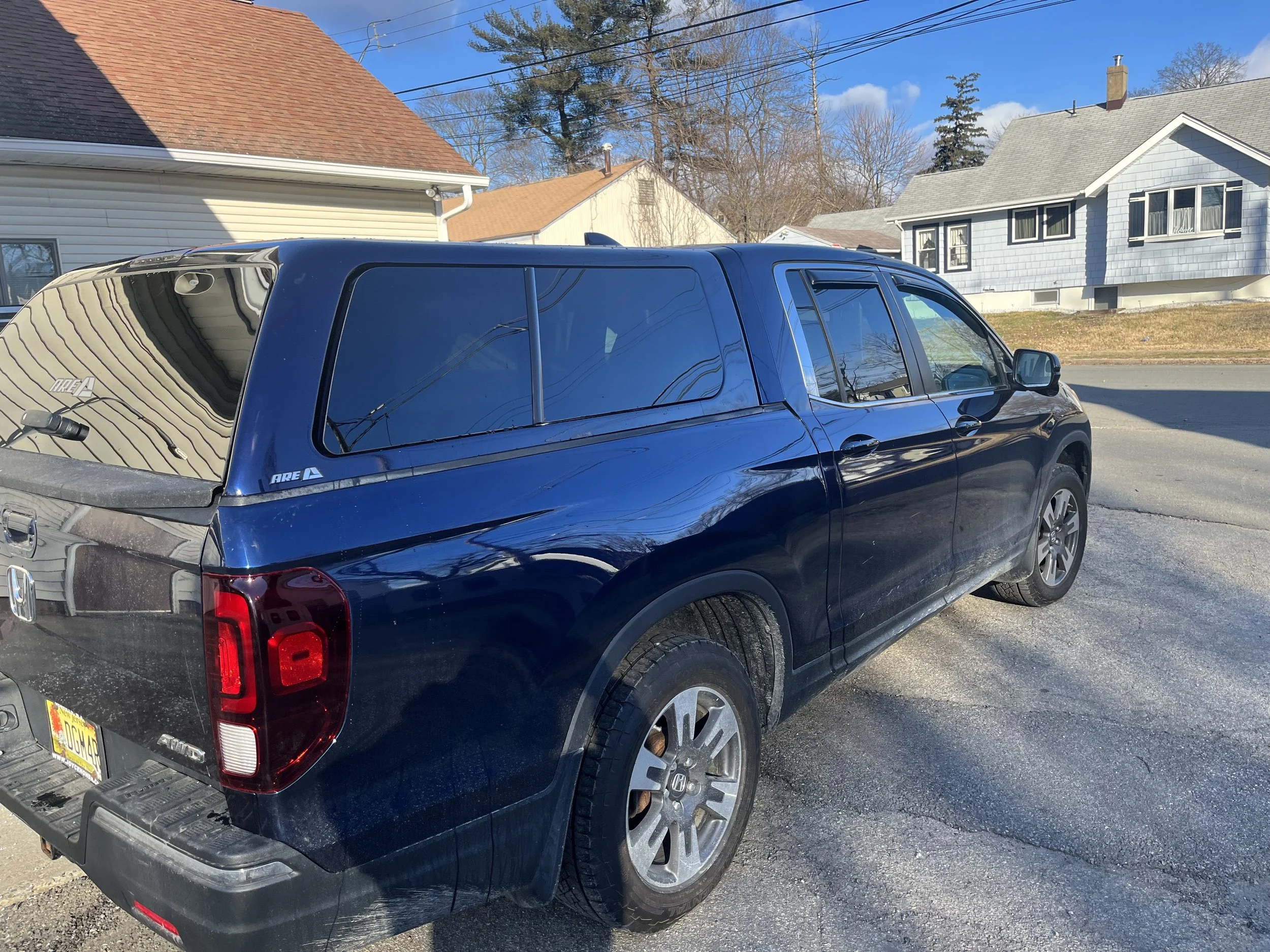 Honda Ridgeline with ARE Z Series Cap — suburbancaps.com