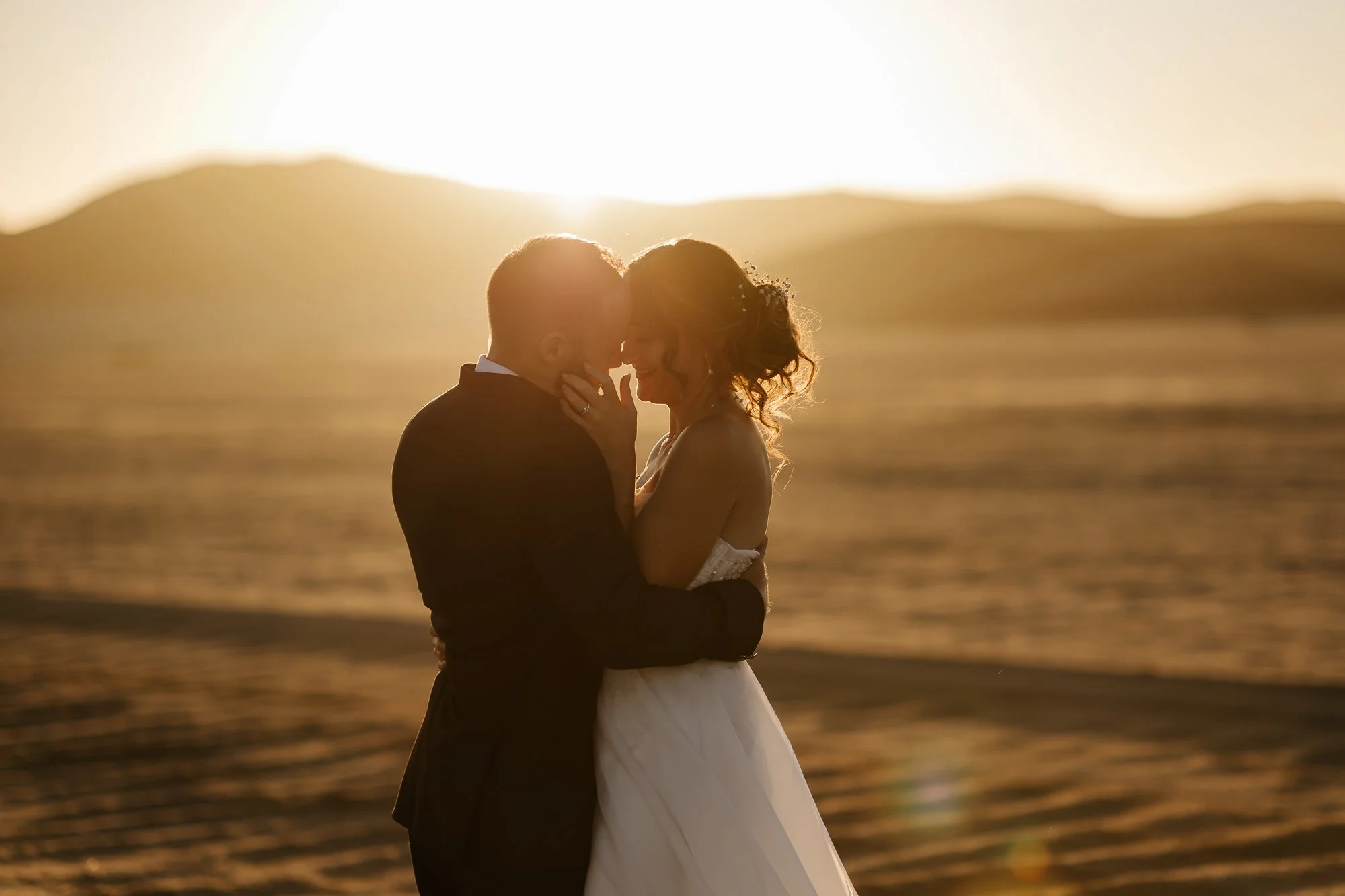 Bride and groom moment in the Namibian desert photographed by Kobus Tollig