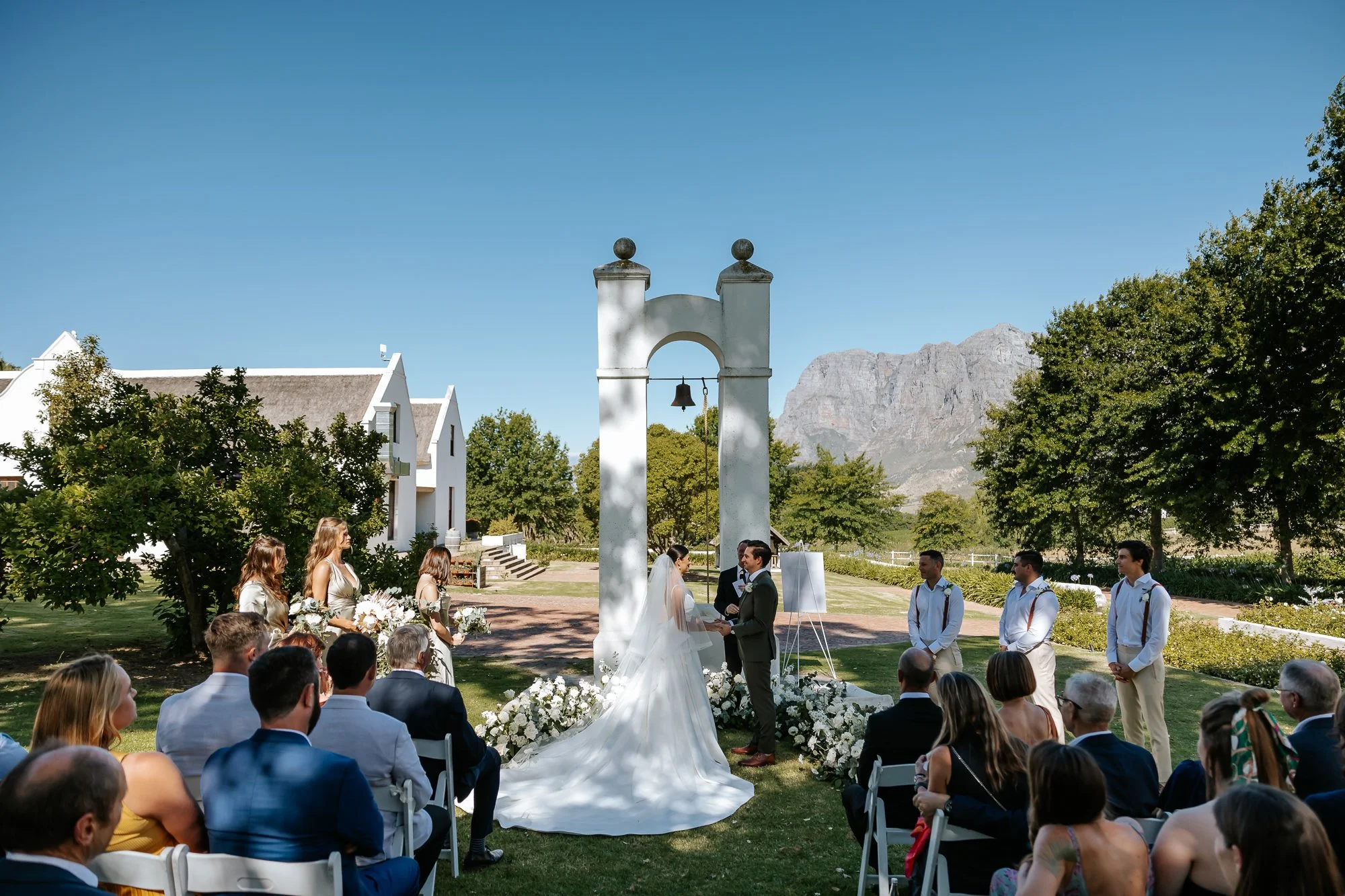 Outdoor wedding ceremony at Zorgvliet Wine Estate in Stellenbosch