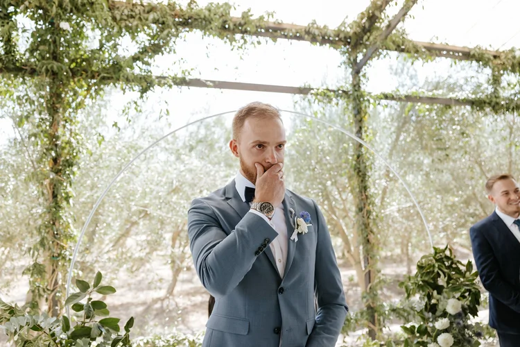 Emotional groom during his Olijvenkraal wedding ceremony