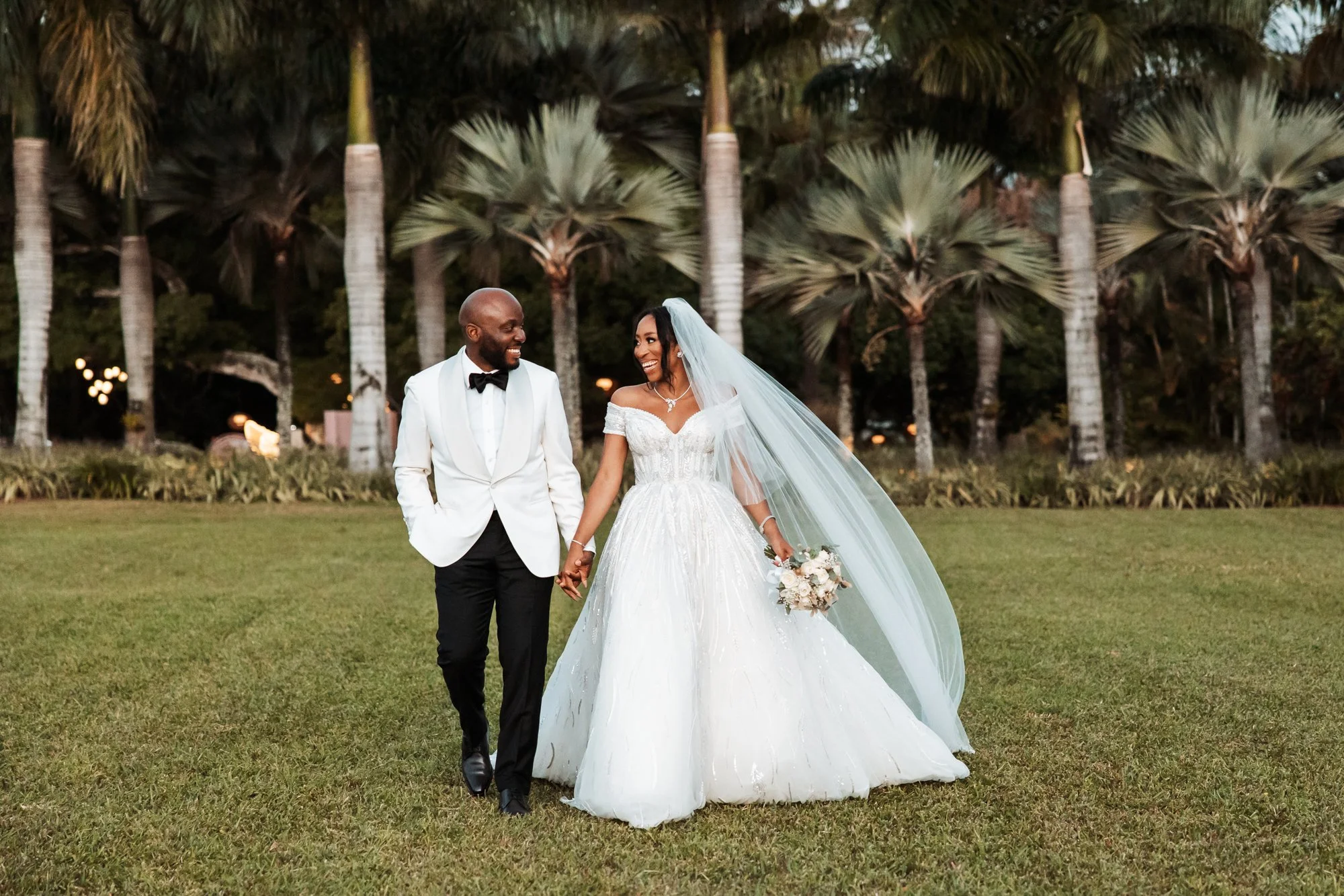 Destination wedding photography in Mauritius beneath tropical palm trees
