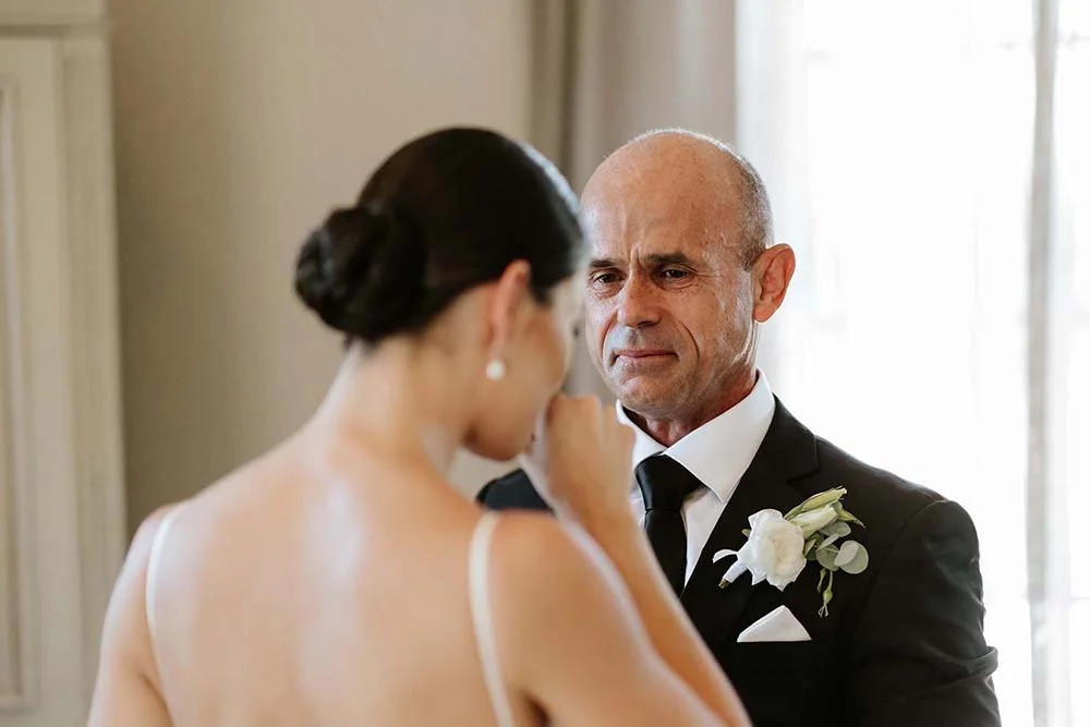 Bride and her father emotional moment with first look