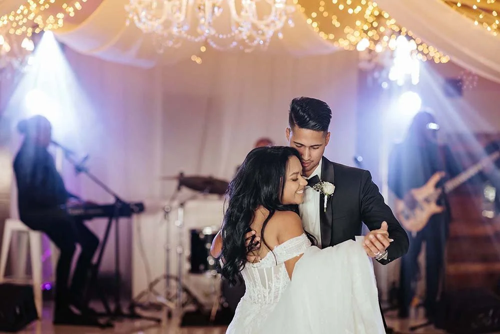 Bride and groom first dance with a live wedding band