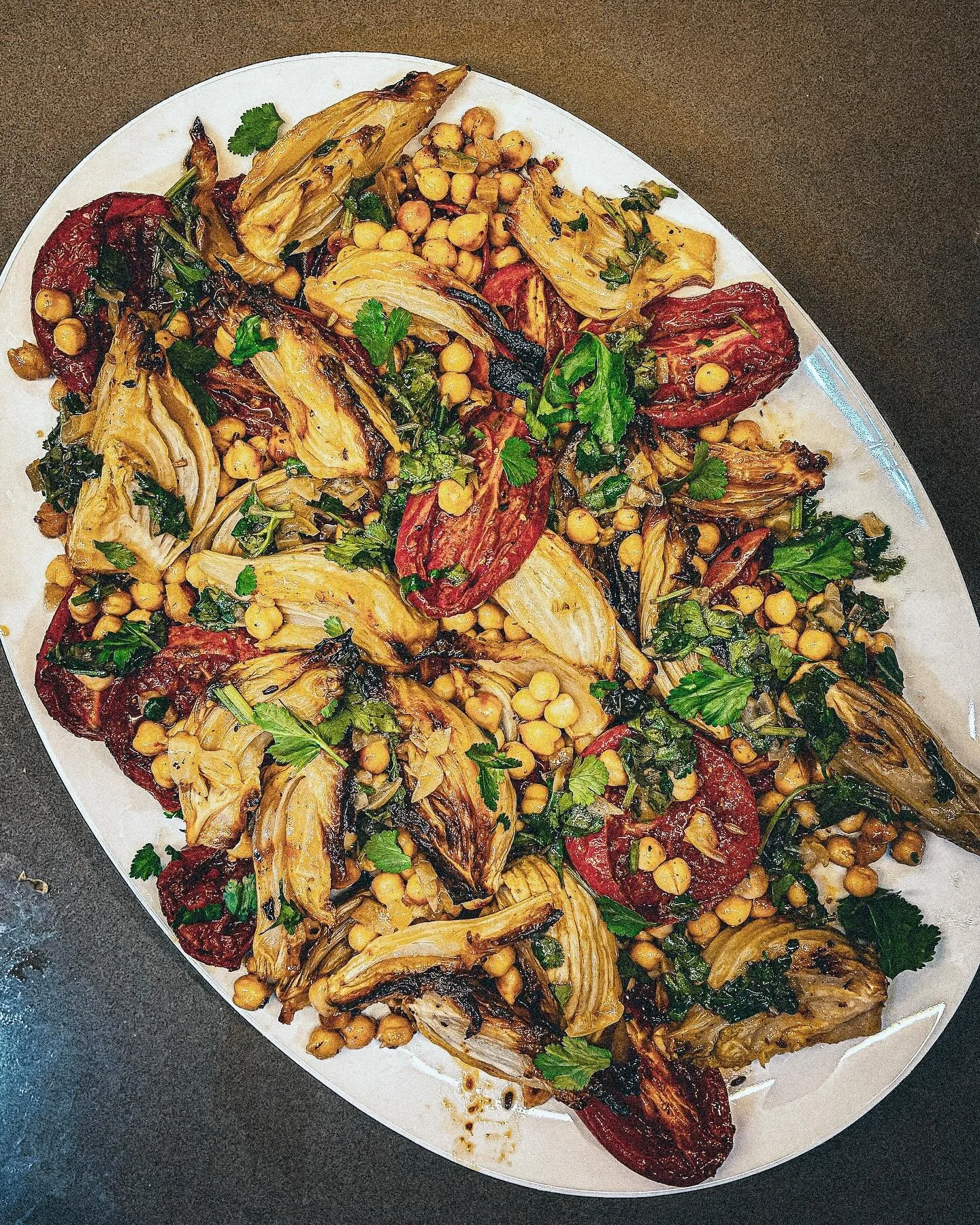 A somewhat dark and moody photo but a blissful antidote to the saccharine sweetness of Easter&hellip; 

Diana Henry&rsquo;s roast fennel, tomato and chickpea heaven with preserved lemon and honey dressing. With heaps of harissa, coriander and garlic.