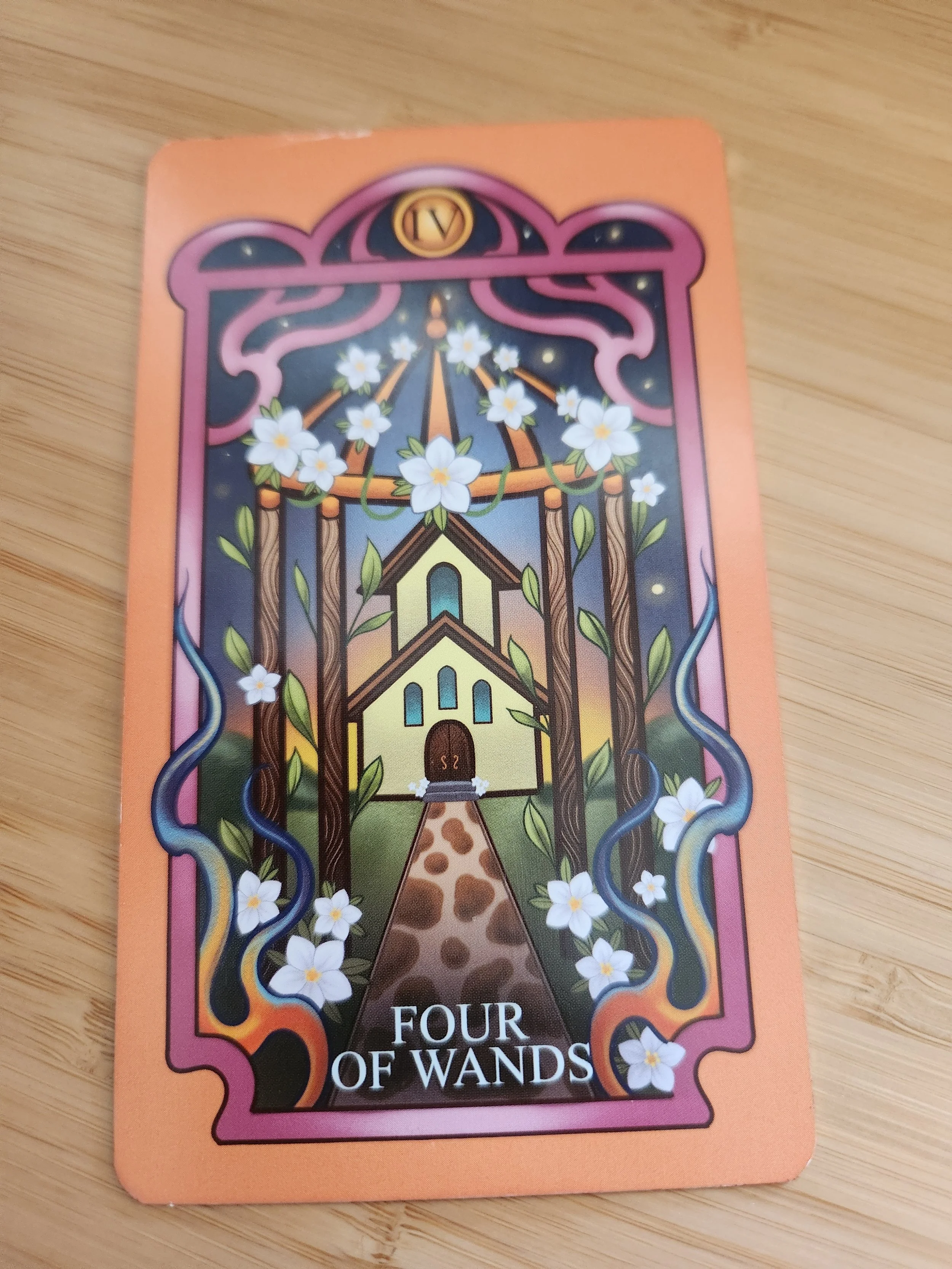Four of Wands tarot card symbolizing stability, celebration, and belonging