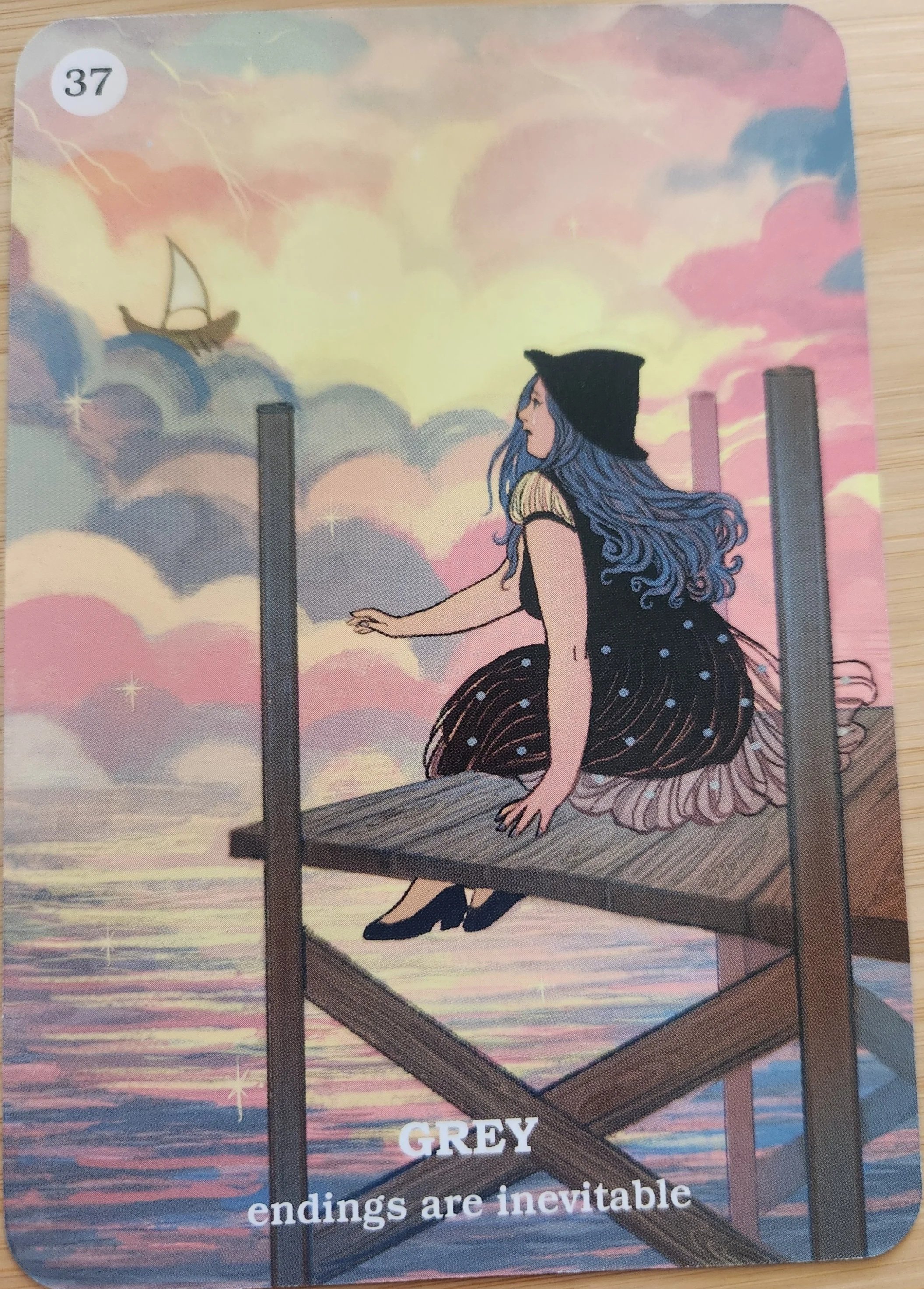 Gray oracle card meaning endings, acceptance, and closure