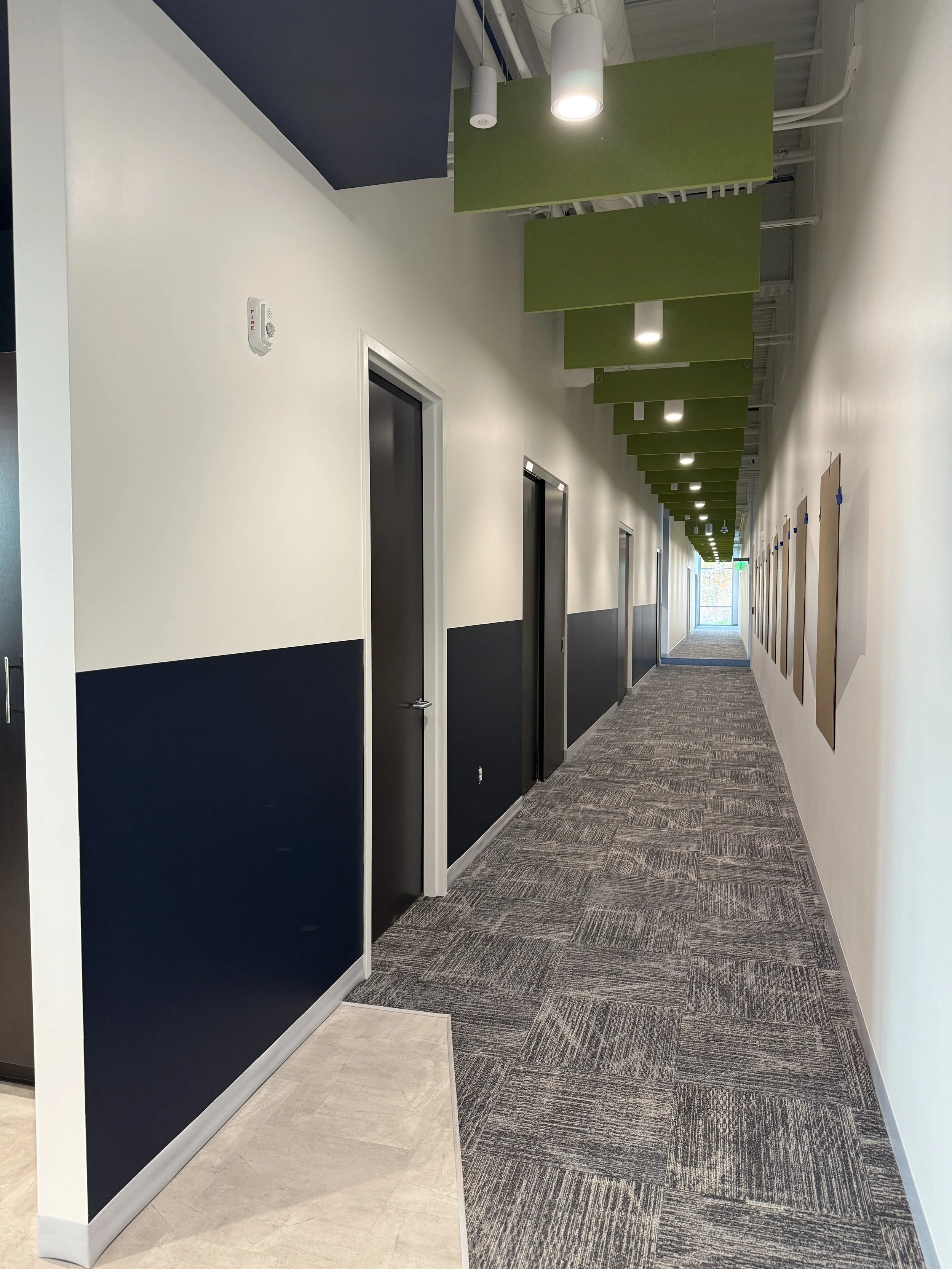 Half wall painted in "Anchors Aweigh" from Sherwin Williams at a business in Canton, OH