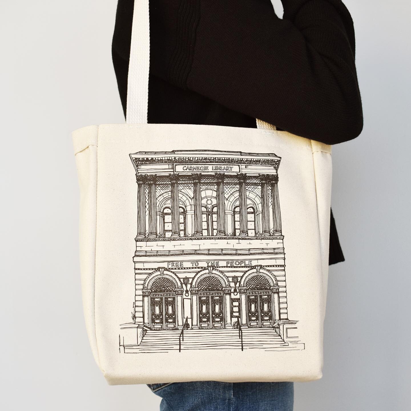 New heavy duty natural canvas library tote bag! 📚This tote bag is printed with our original illustration of Oakland&rsquo;s Carnegie main library. This bag is super durable and can hold a number of books (even the big art books 😊) it also has an in