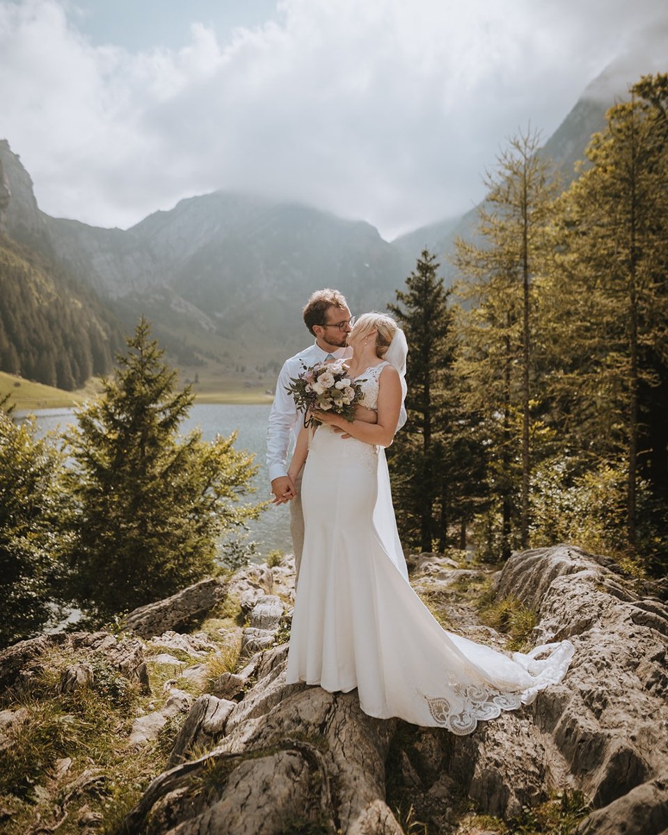 Imagine gliding across a crystal-clear alpine lake in a small wooden boat. The water is calm. The mountains rise majestically around you. The air is fresh and cool, and the only sounds are the gentle lapping of water and birds calling in the distance